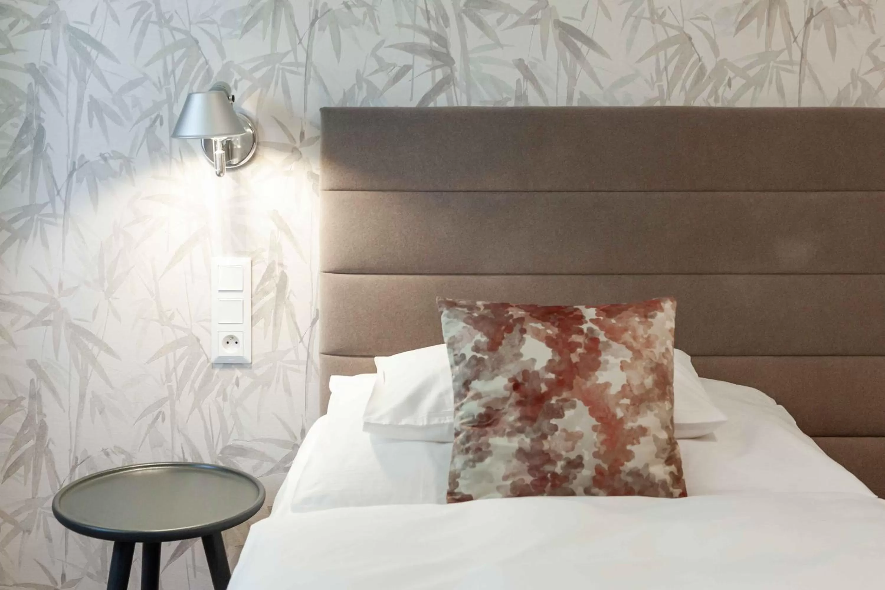 Bed in Equitana Hotel Resort