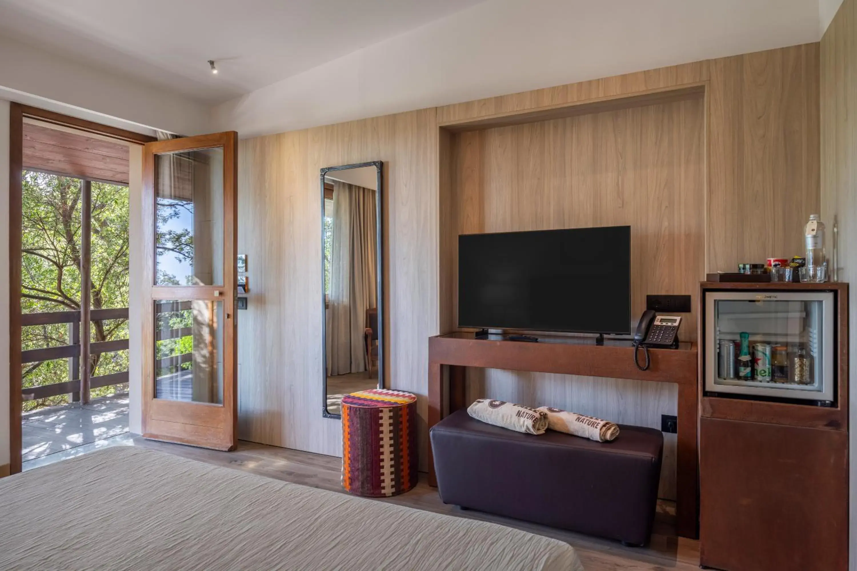 Bedroom, TV/Entertainment Center in Vallegrande Nature Resort by Geocharme