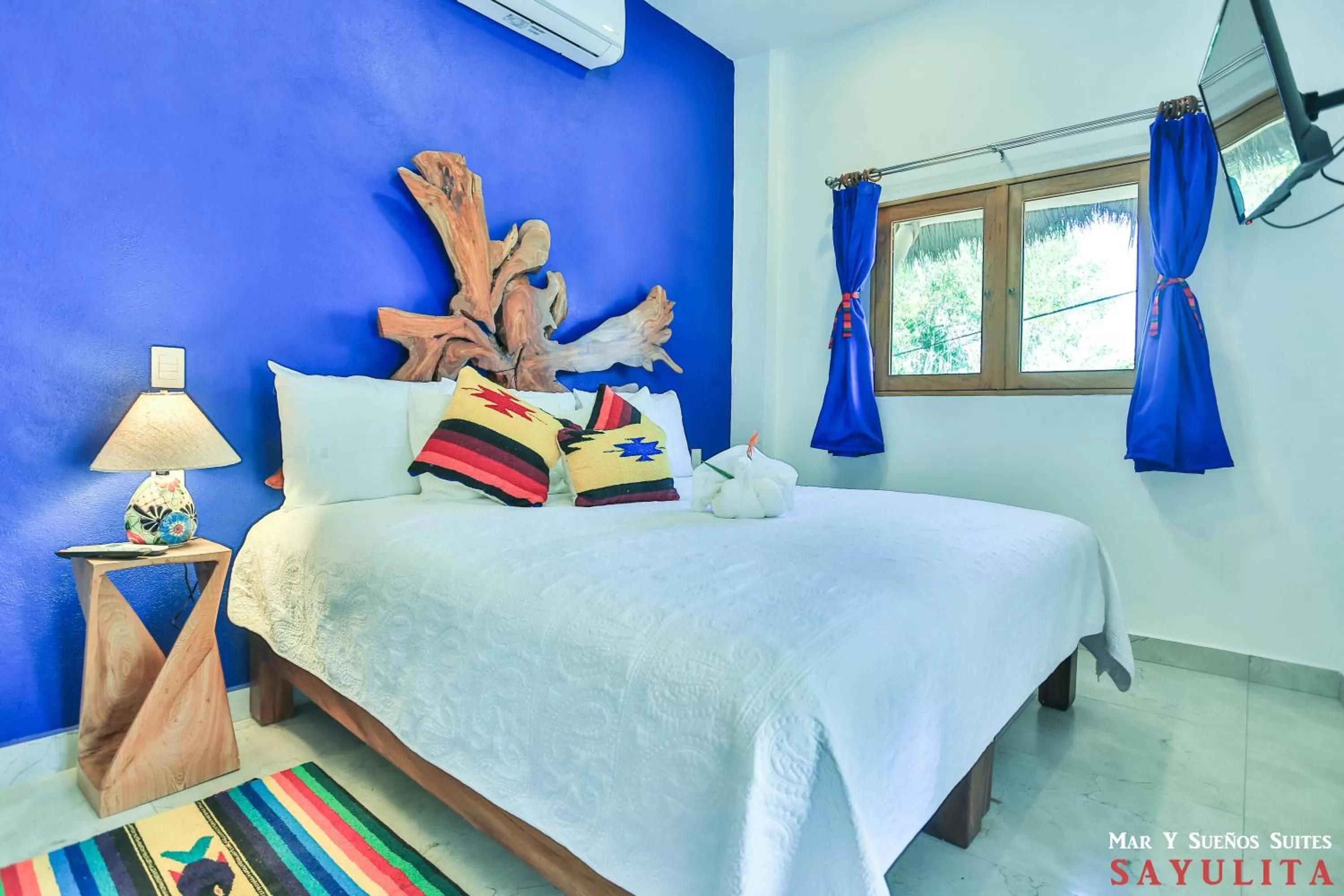 Bed in Mar y Sueños Suites