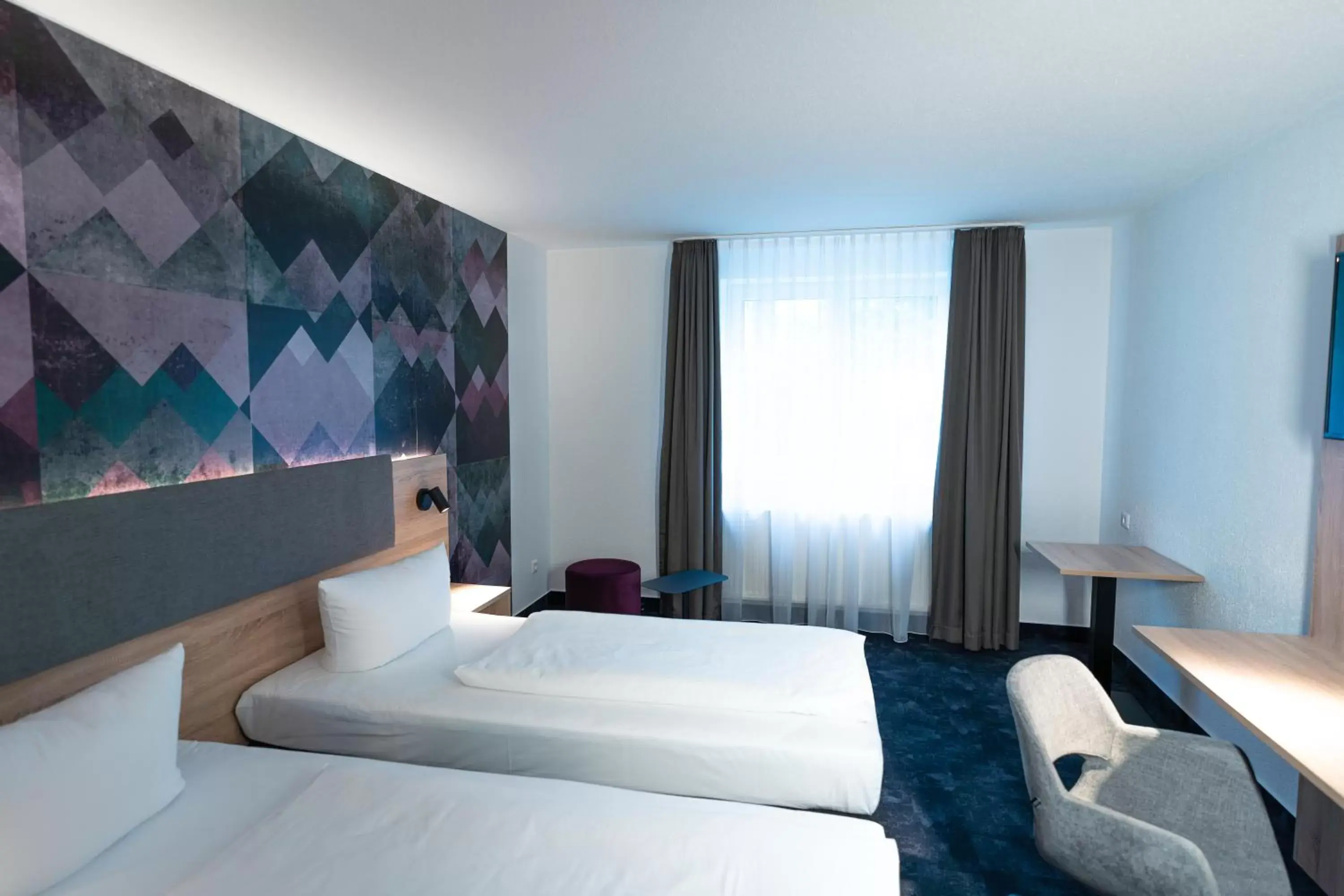 Photo of the whole room, Bed in Taste Hotel Jettingen