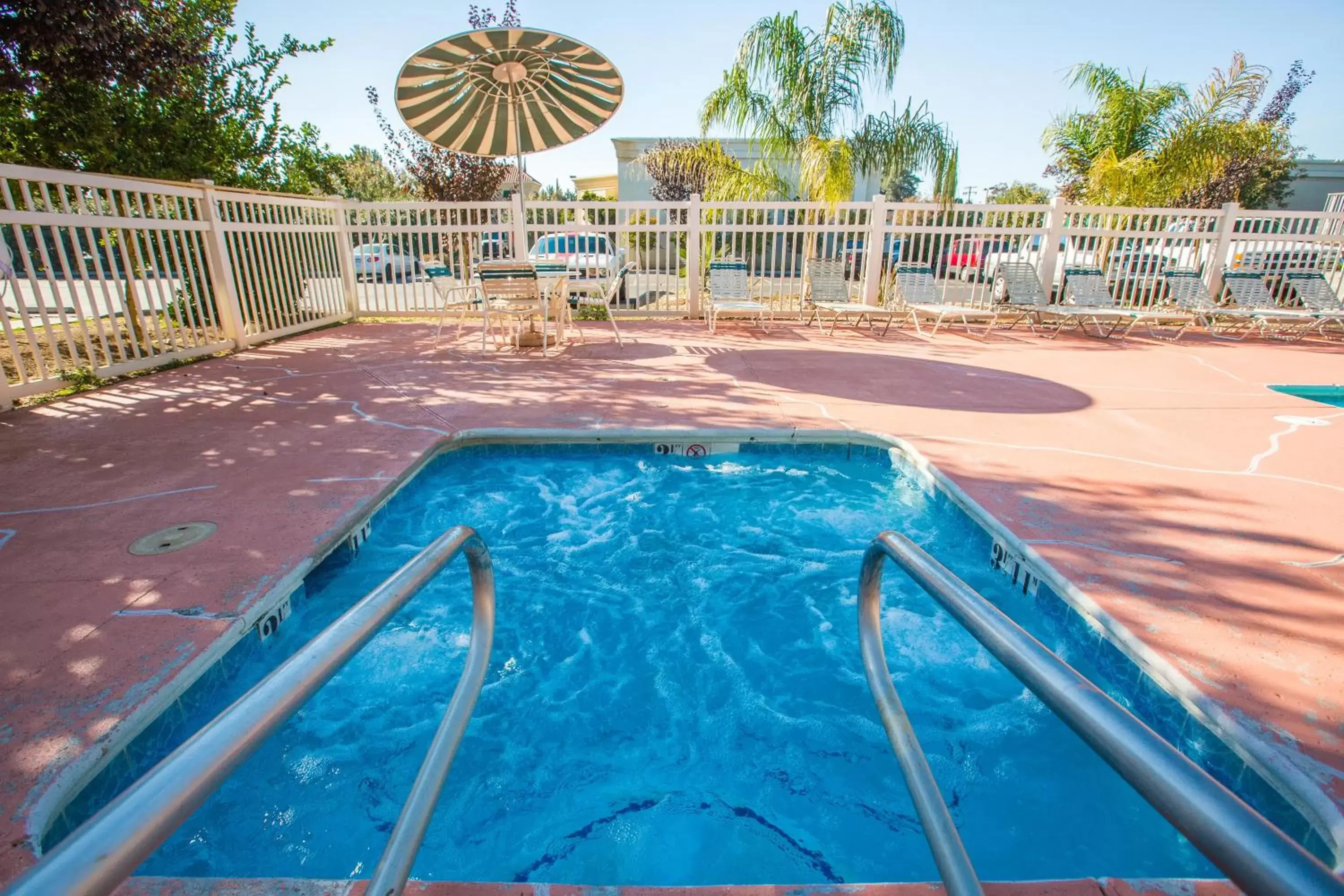 Day, Swimming Pool in University Inn Fresno