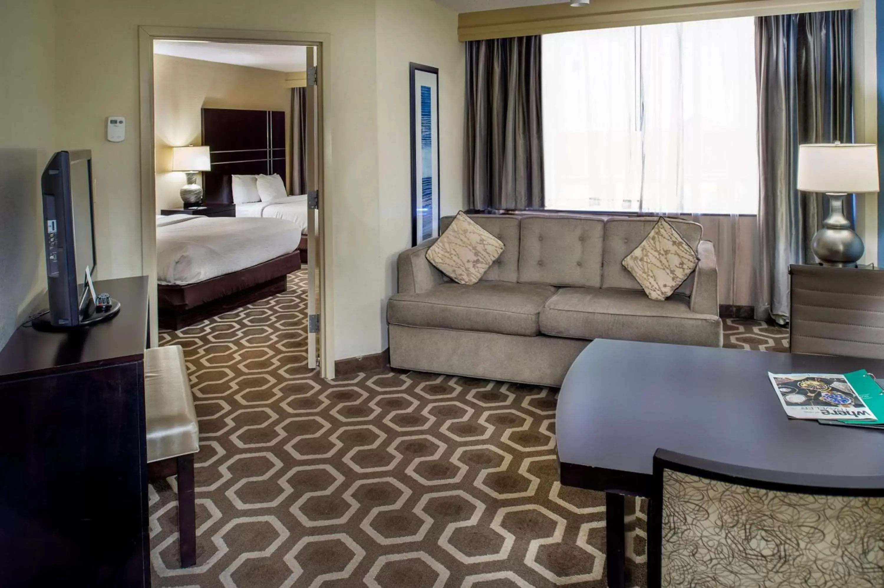 Bedroom, Seating Area in Embassy Suites by Hilton St Louis Airport