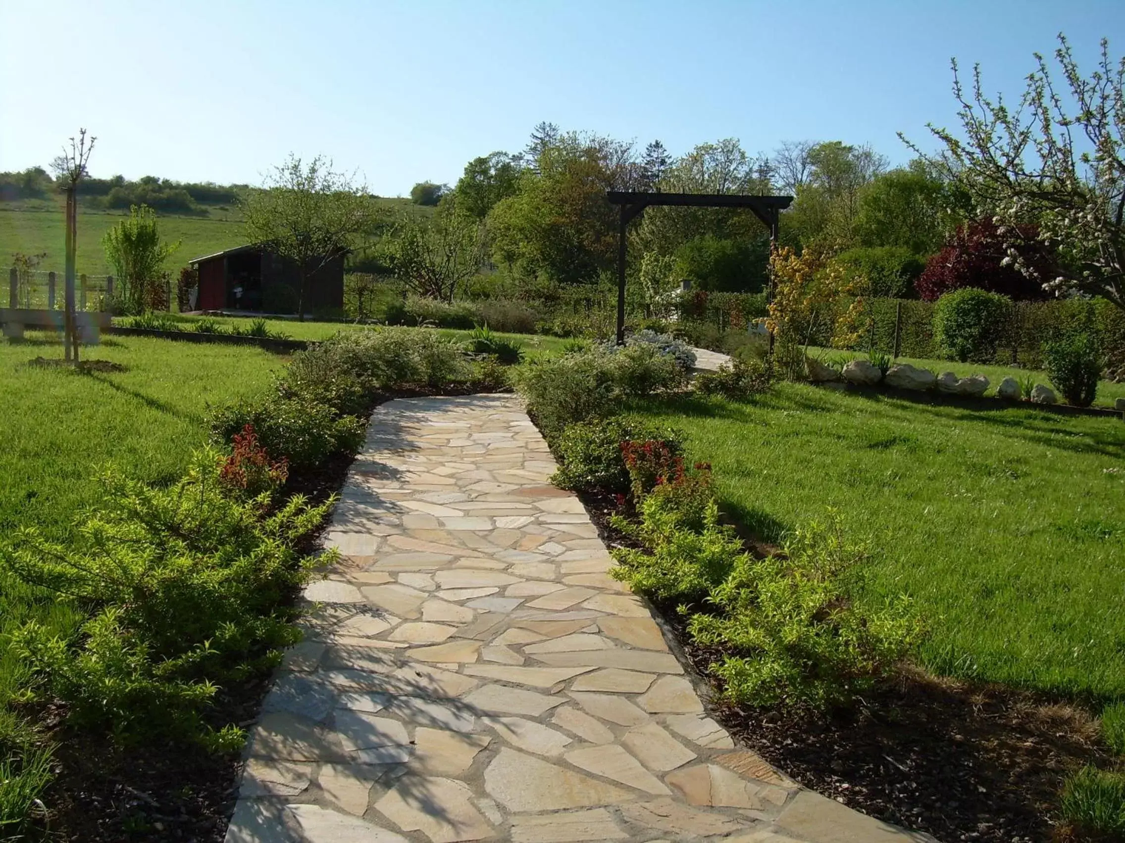 Garden in Hôtel-Logis La Coraline