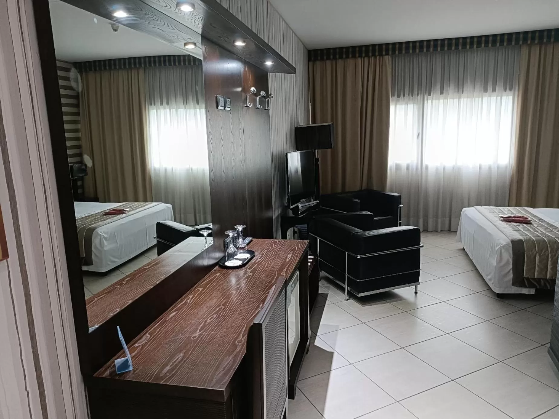 Communal lounge/ TV room, Bed in Green Hotel Ninfa