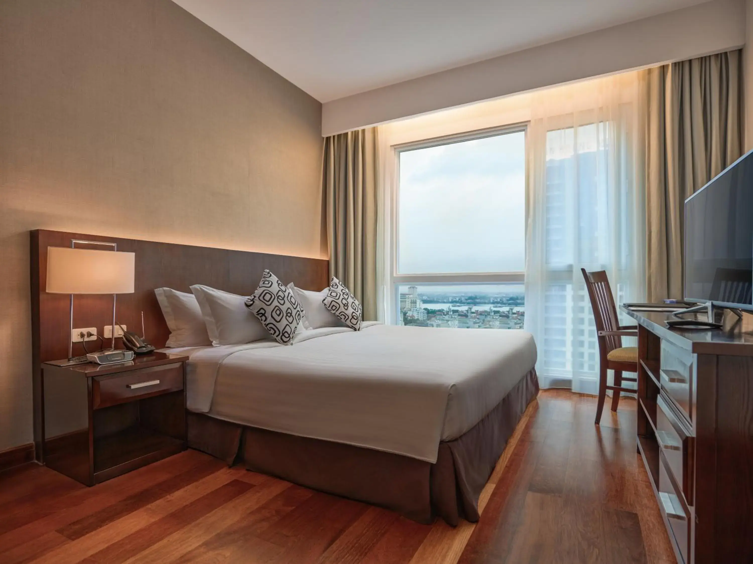 Bed in Fraser Suites Hanoi