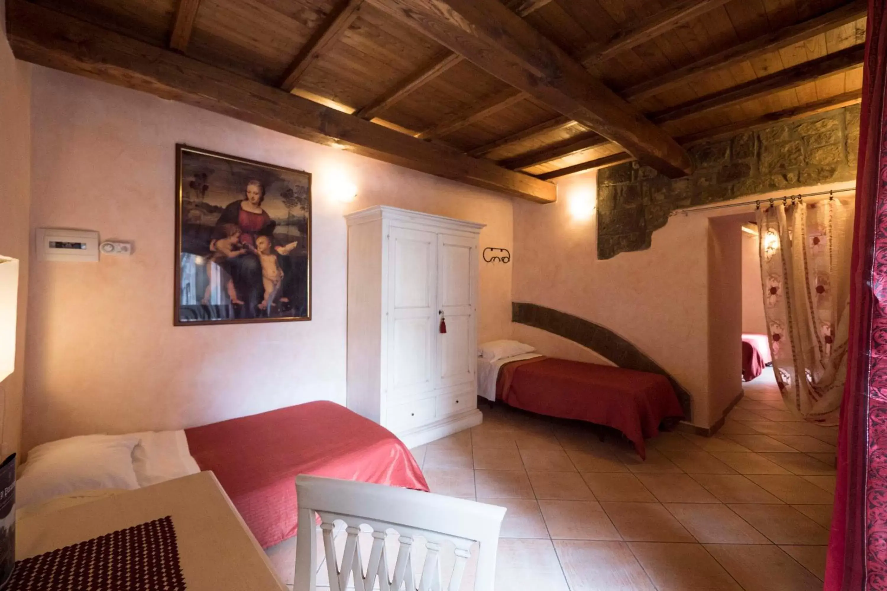 Photo of the whole room, Bed in Paradosso Village