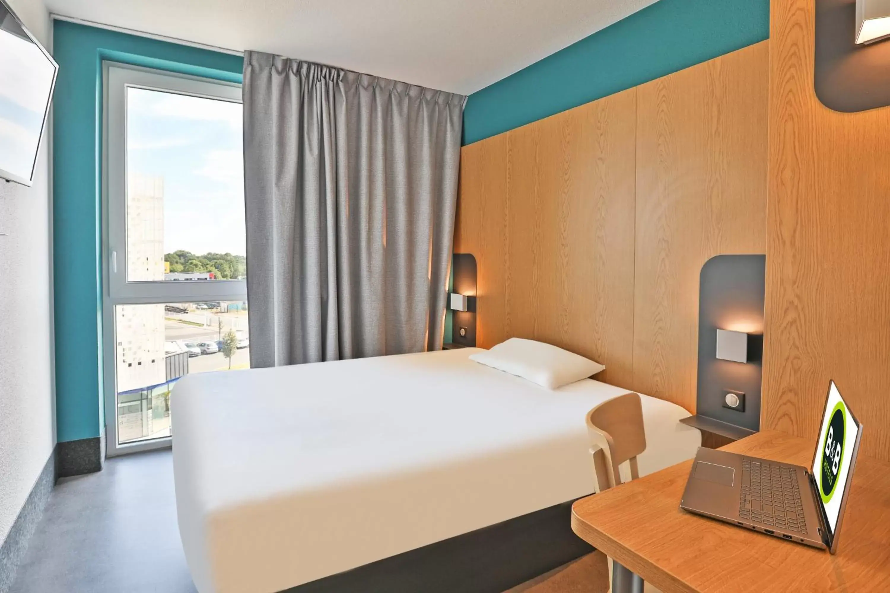 Bedroom, Bed in B&B HOTEL La Roche-sur-Yon