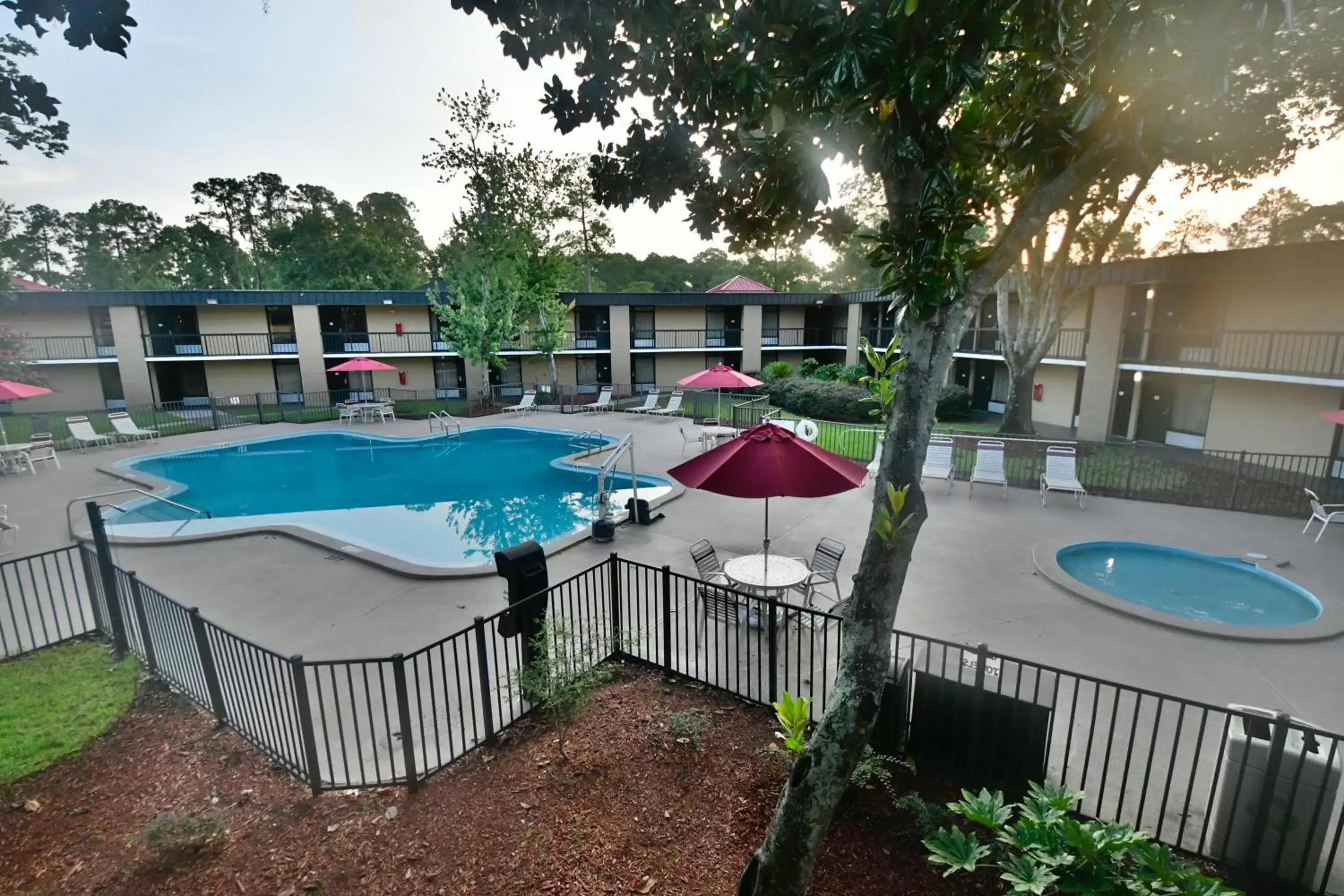 , Swimming Pool in Ramada by Wyndham Jacksonville Hotel & Conference Center