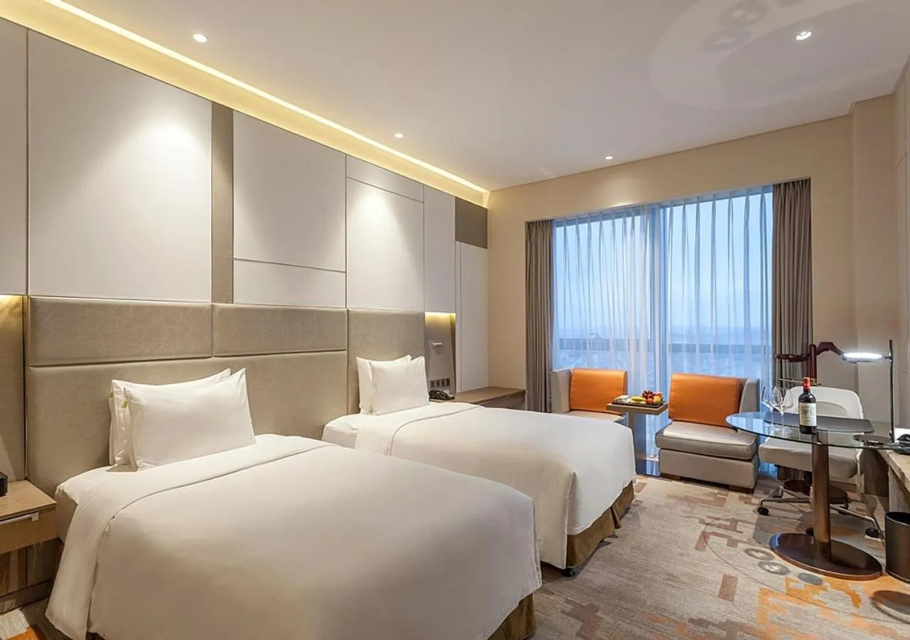 Photo of the whole room, Bed in Radisson Exhibition Center Shanghai