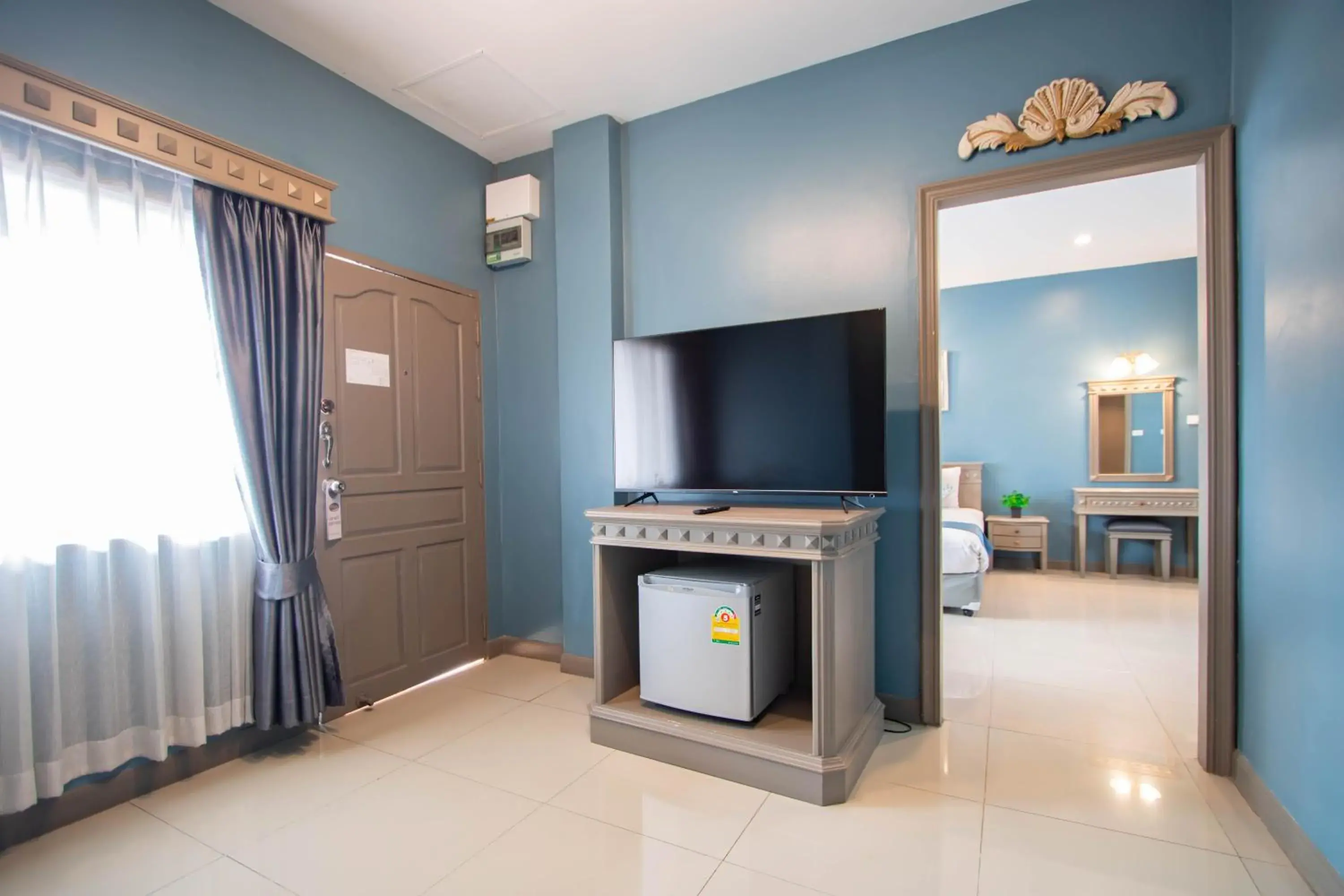 Bedroom, TV/Entertainment Center in Eurana Boutique Hotel