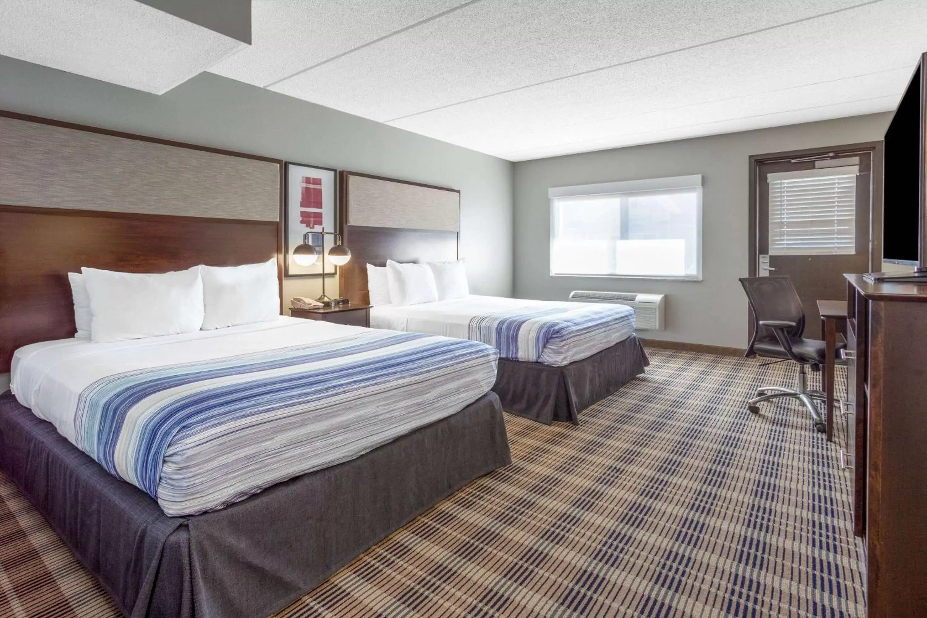 Photo of the whole room, Bed in AmericInn by Wyndham Madison South