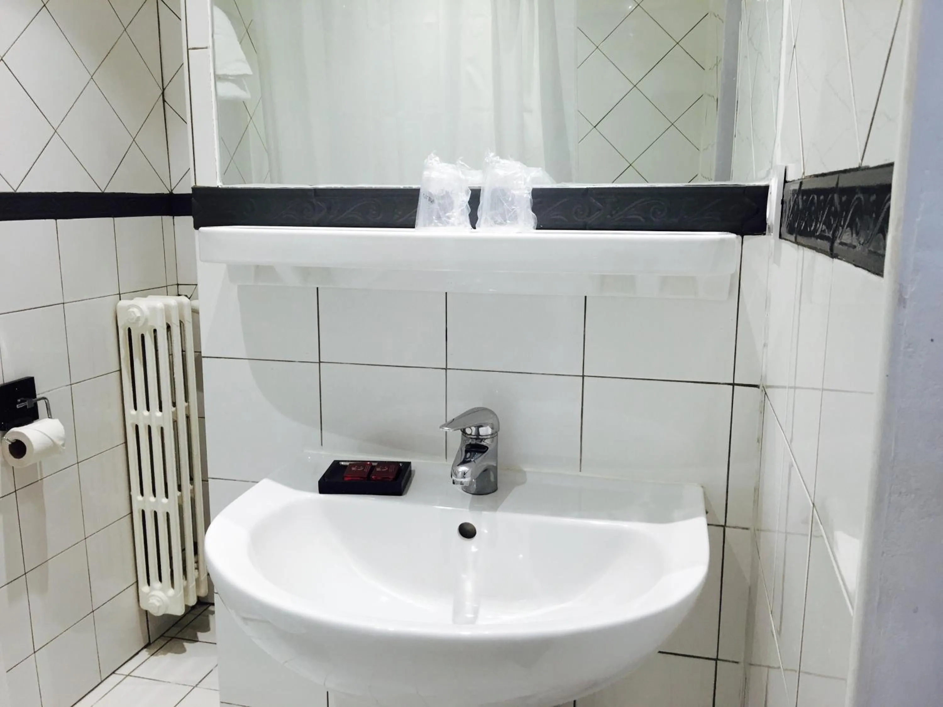 Bathroom in Hôtel Le Capitole