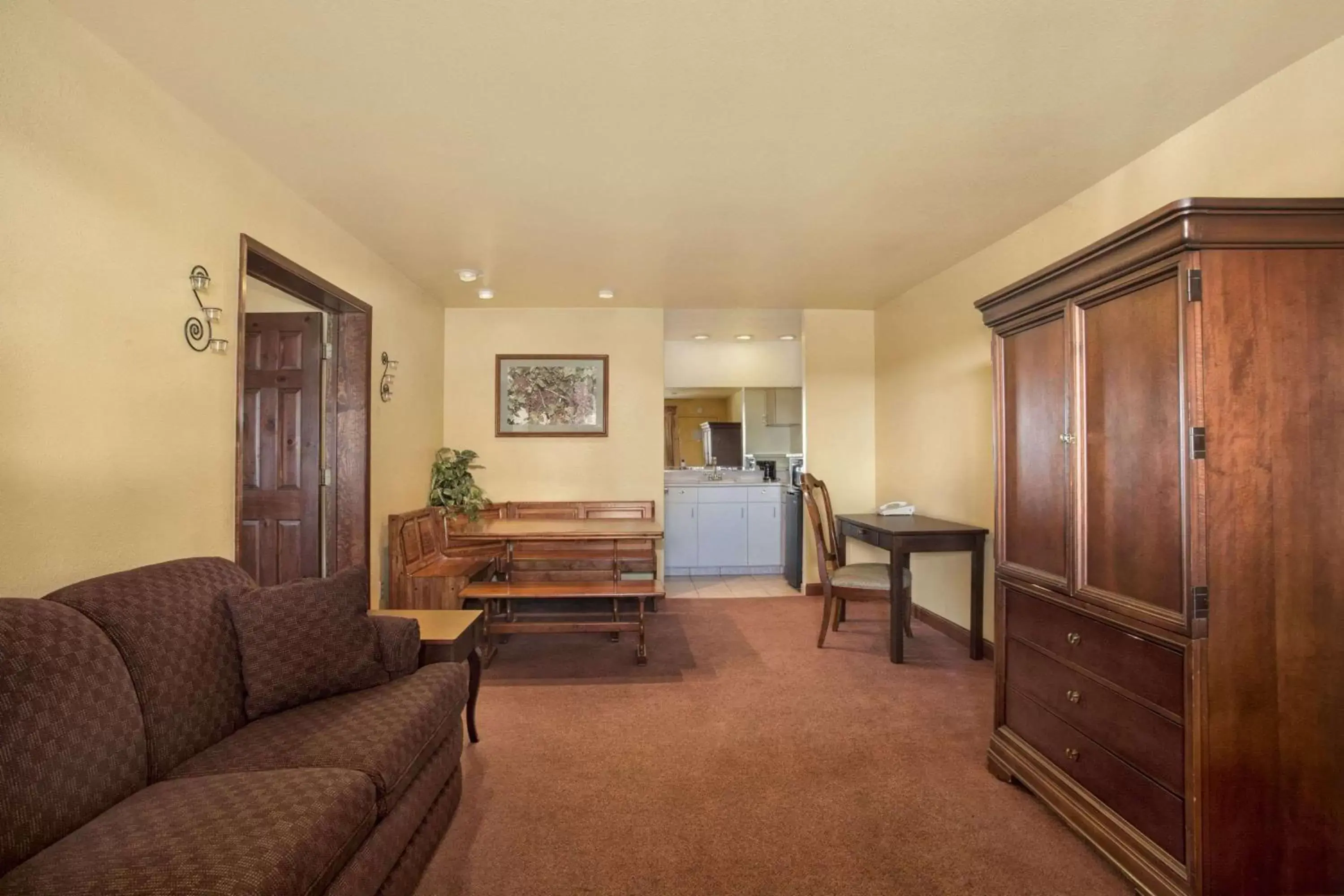 Photo of the whole room, Seating Area in Travelodge by Wyndham Lemoore Near Naval Air Station