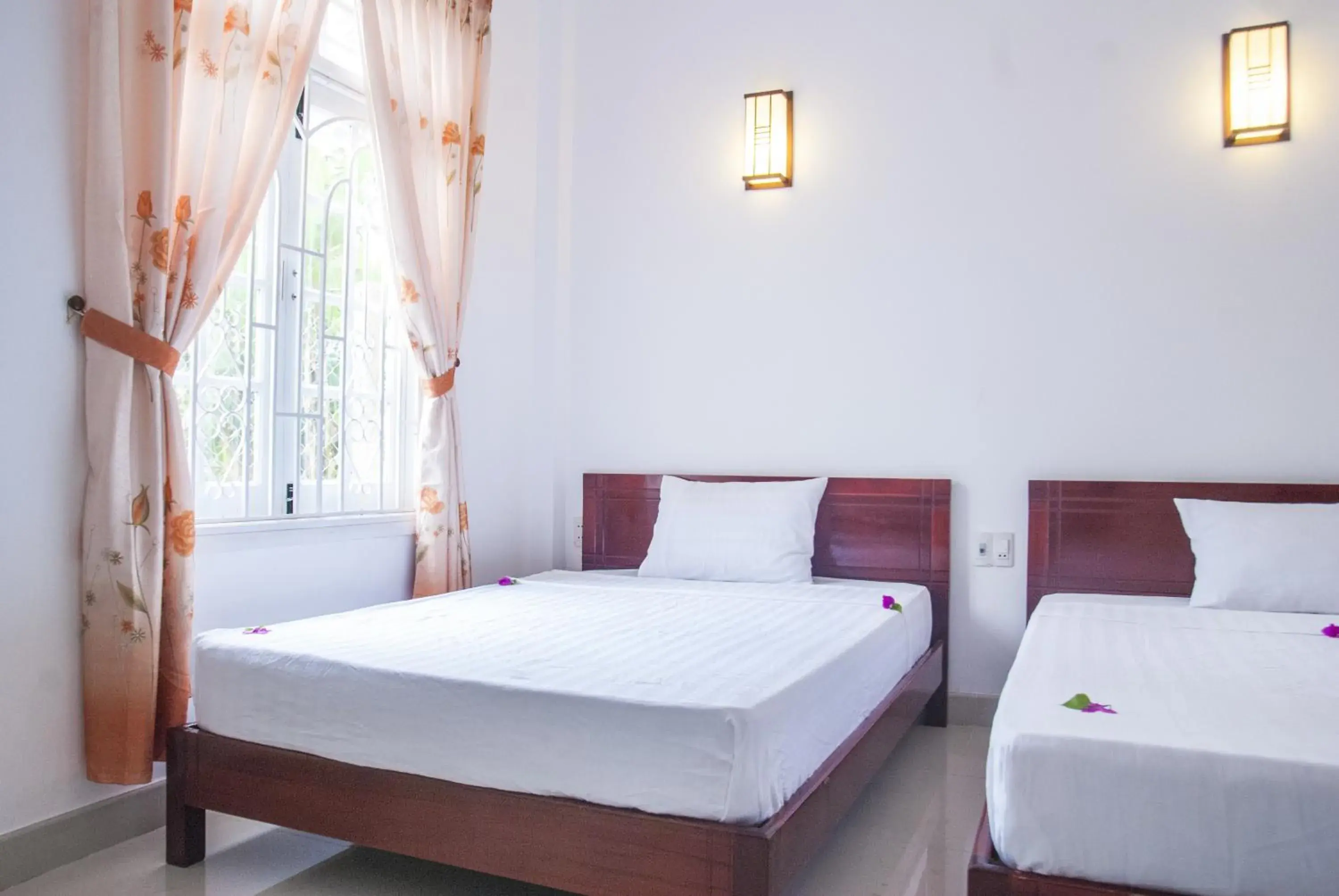 Bed in Mango Garden Hoi An Homestay