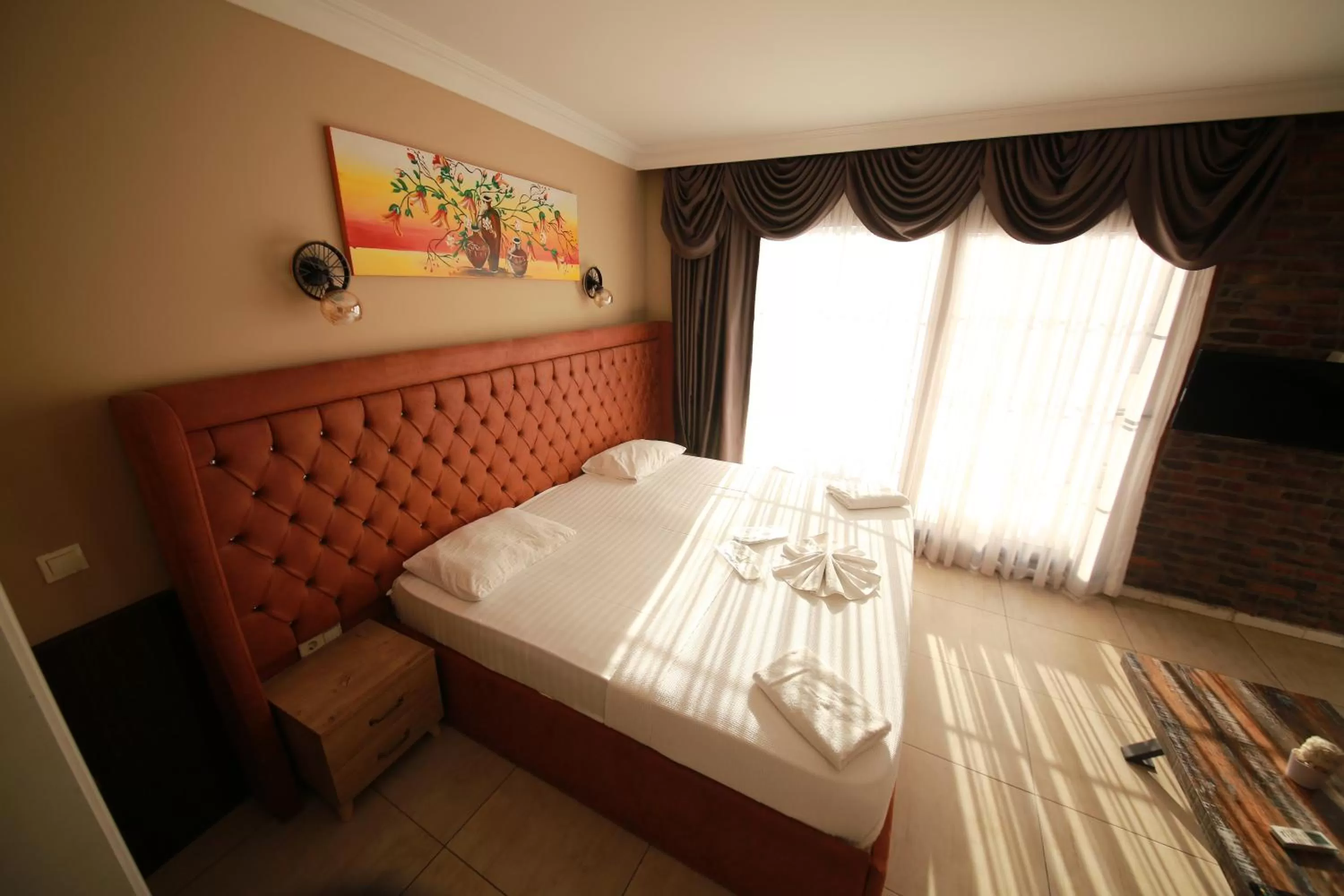 Bed in Royal Palace Hotel