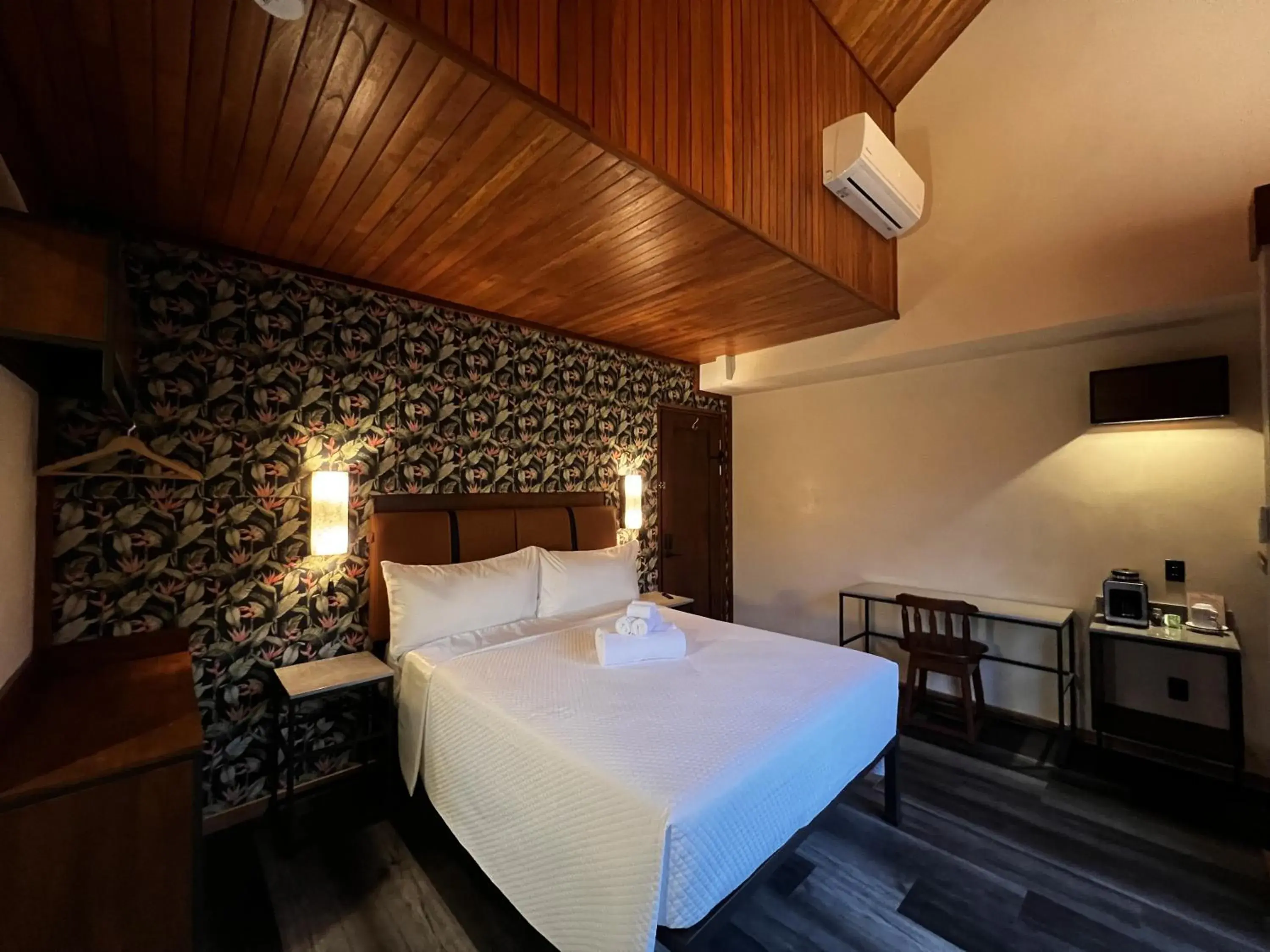 Seating area, Bed in SUWA VILLA ARENAL