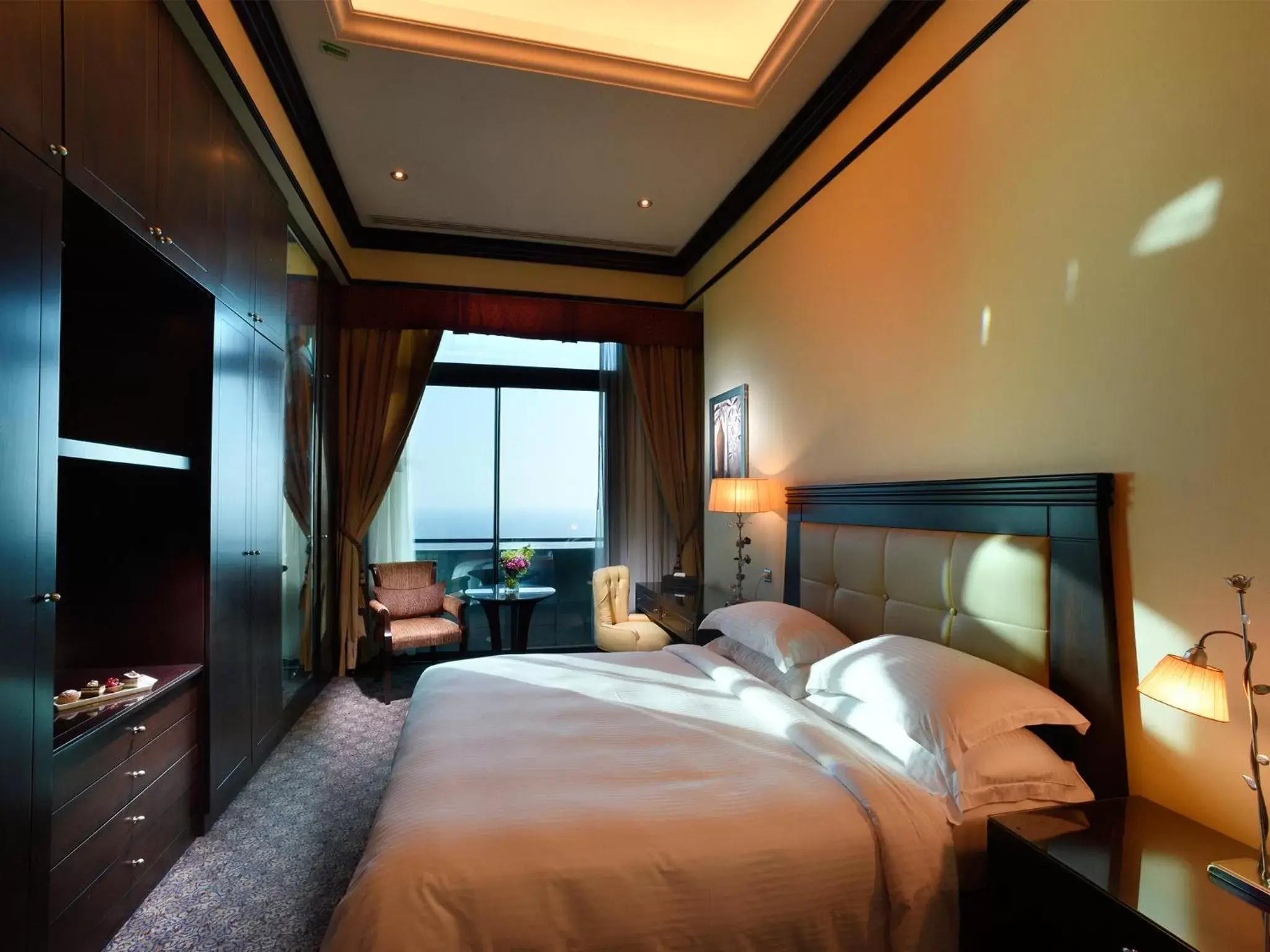 Photo of the whole room, Bed in Raouche Arjaan by Rotana Photo of the whole room, Bed in Raouche Arjaan by Rotana