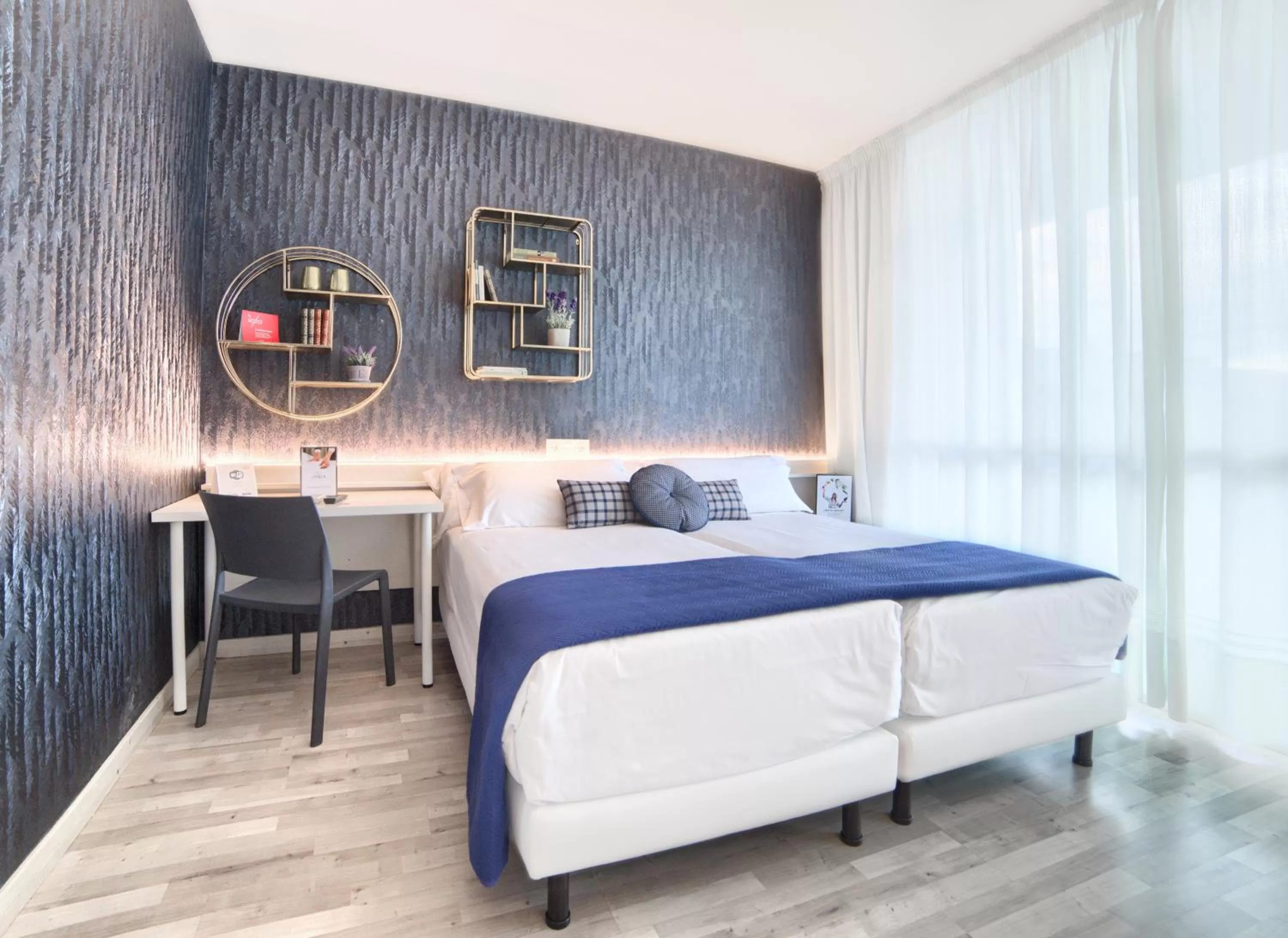 Bed in Hotel Luze El Villa