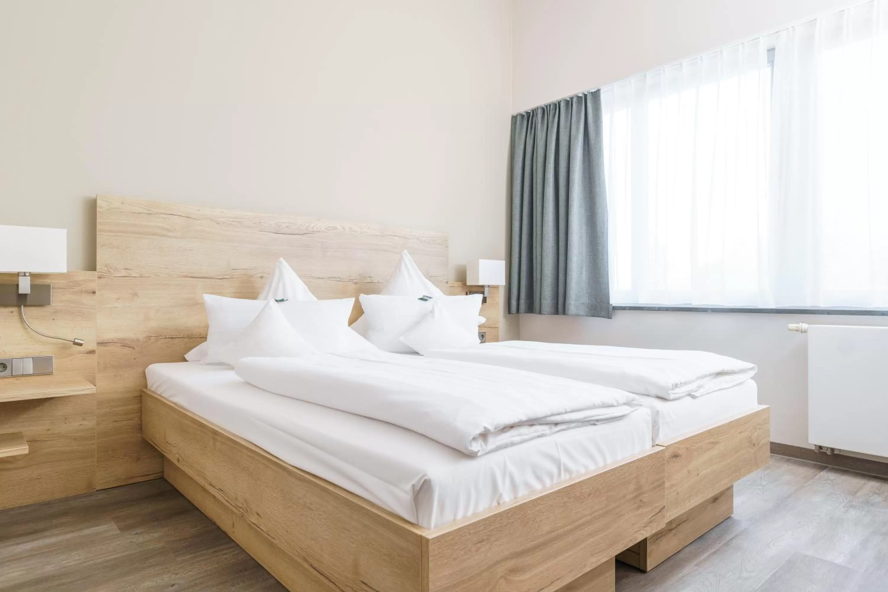 Bed in Hotel Forsthaus Grüna Betreibergesellschaft mbH