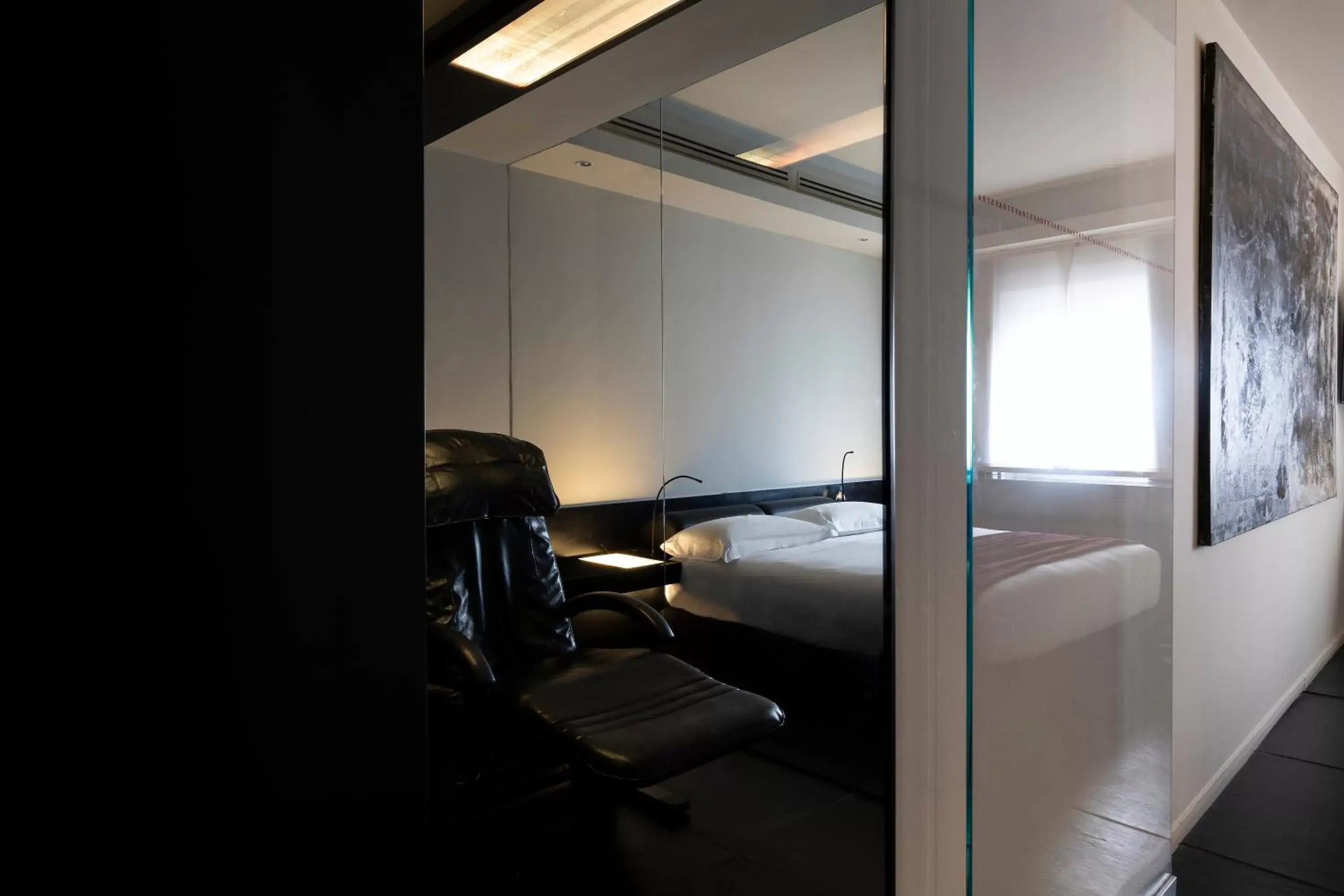 Bed in STRAF, Milan, a Member of Design Hotels