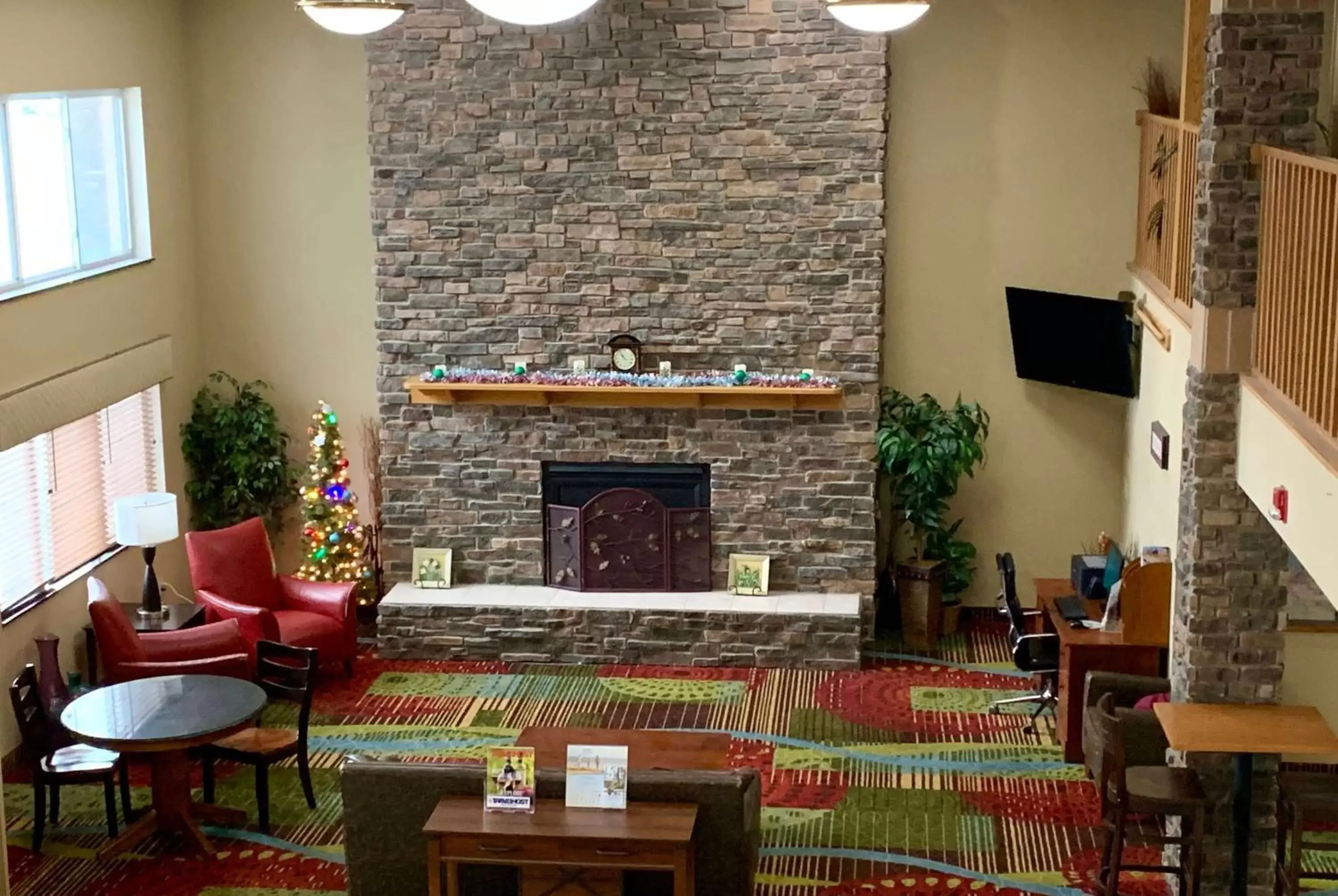 Lobby or reception in AmericInn by Wyndham Wausau