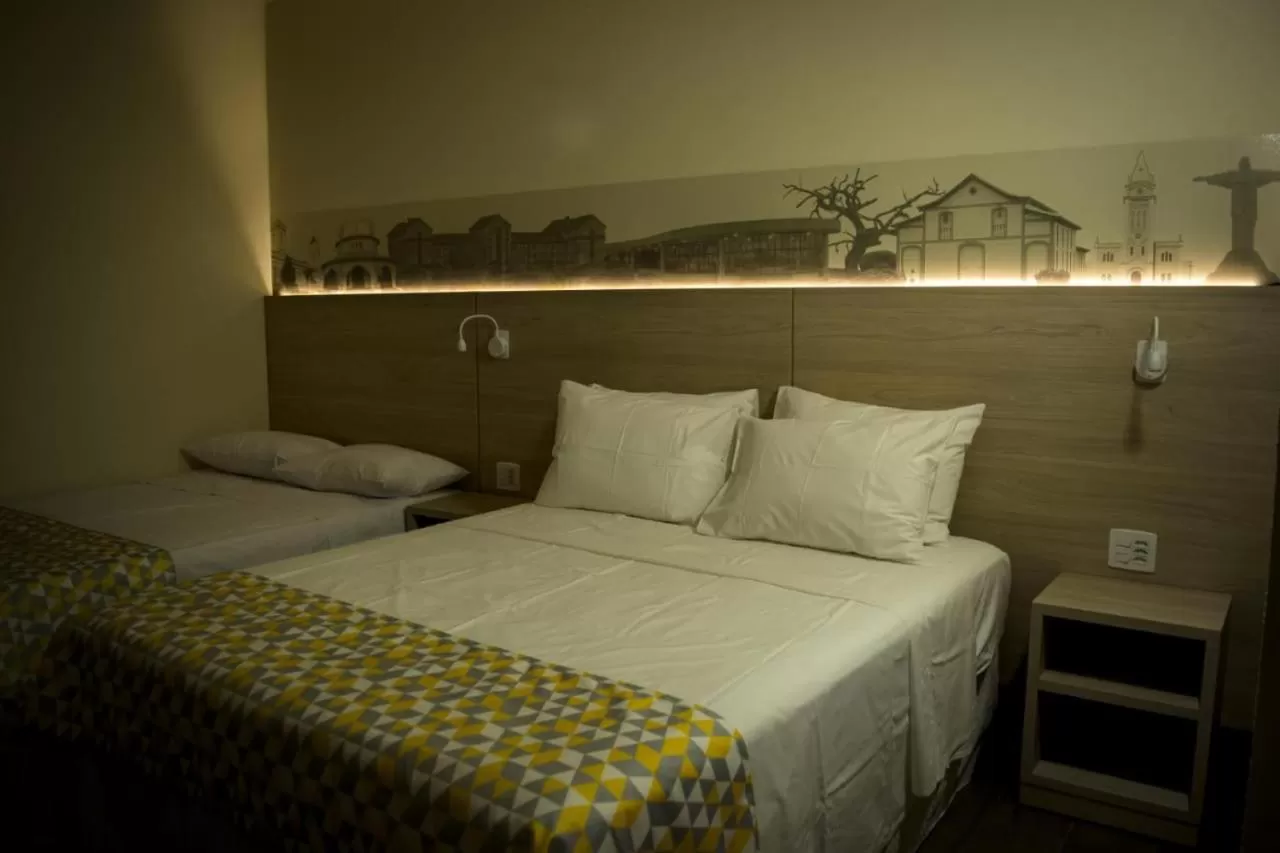 Photo of the whole room, Bed in Pousada Araxá