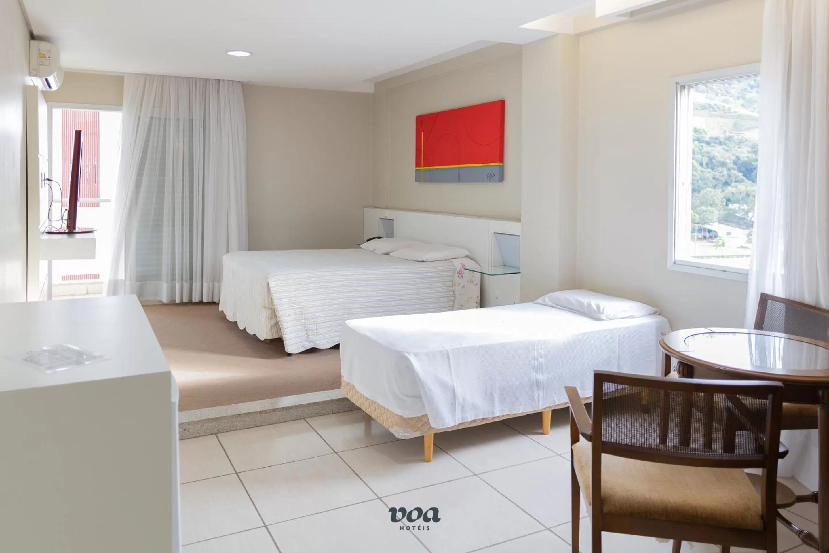 Bed in VOA Plazza Hotel