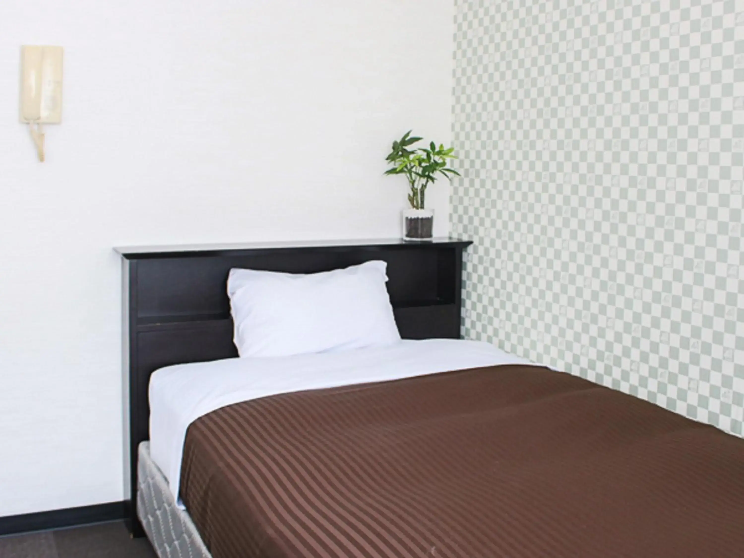 Bed in HOTEL LiVEMAX BUDGET Higashi Ueno