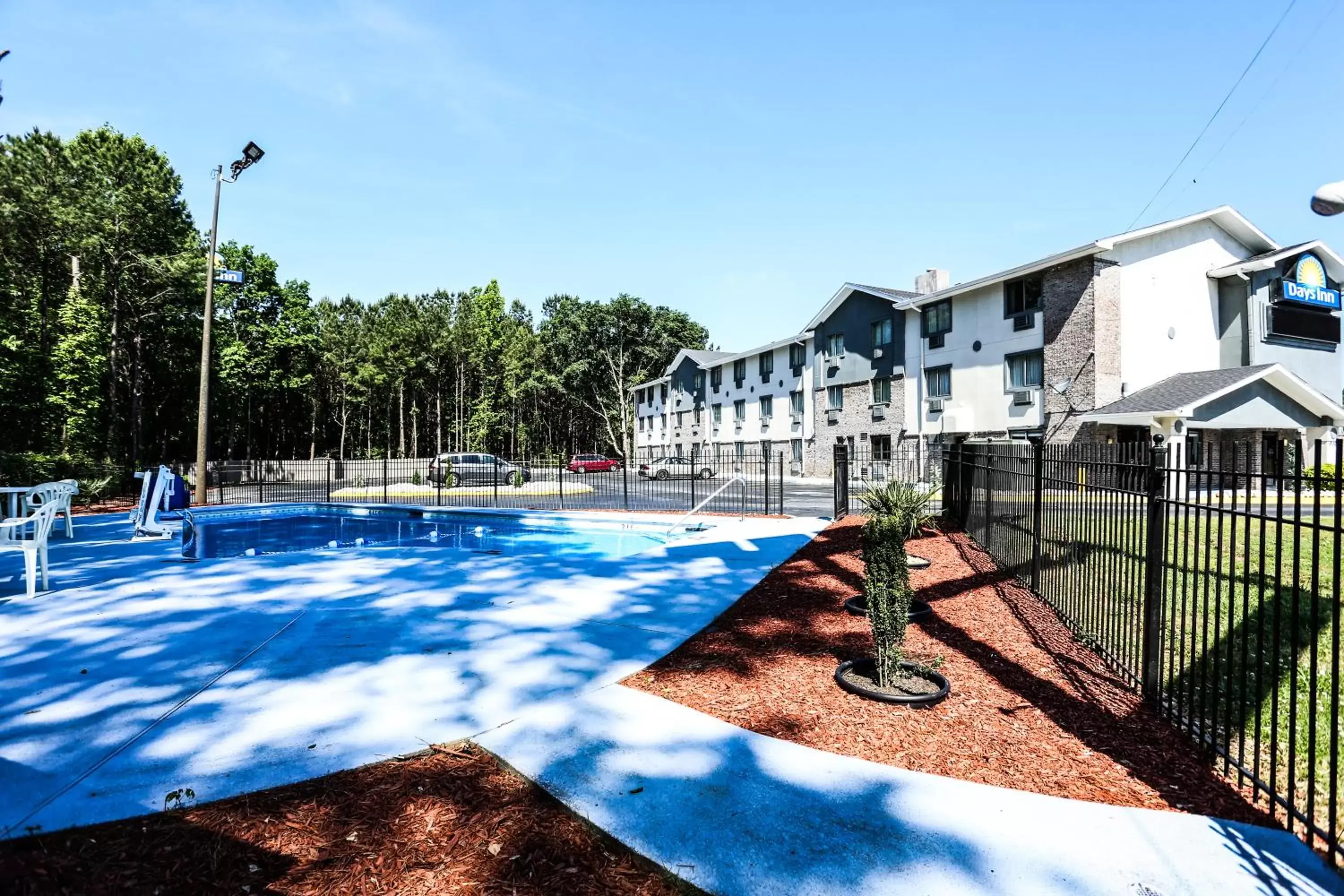 Property building, Swimming Pool in Super 8 by Wyndham Villa Rica