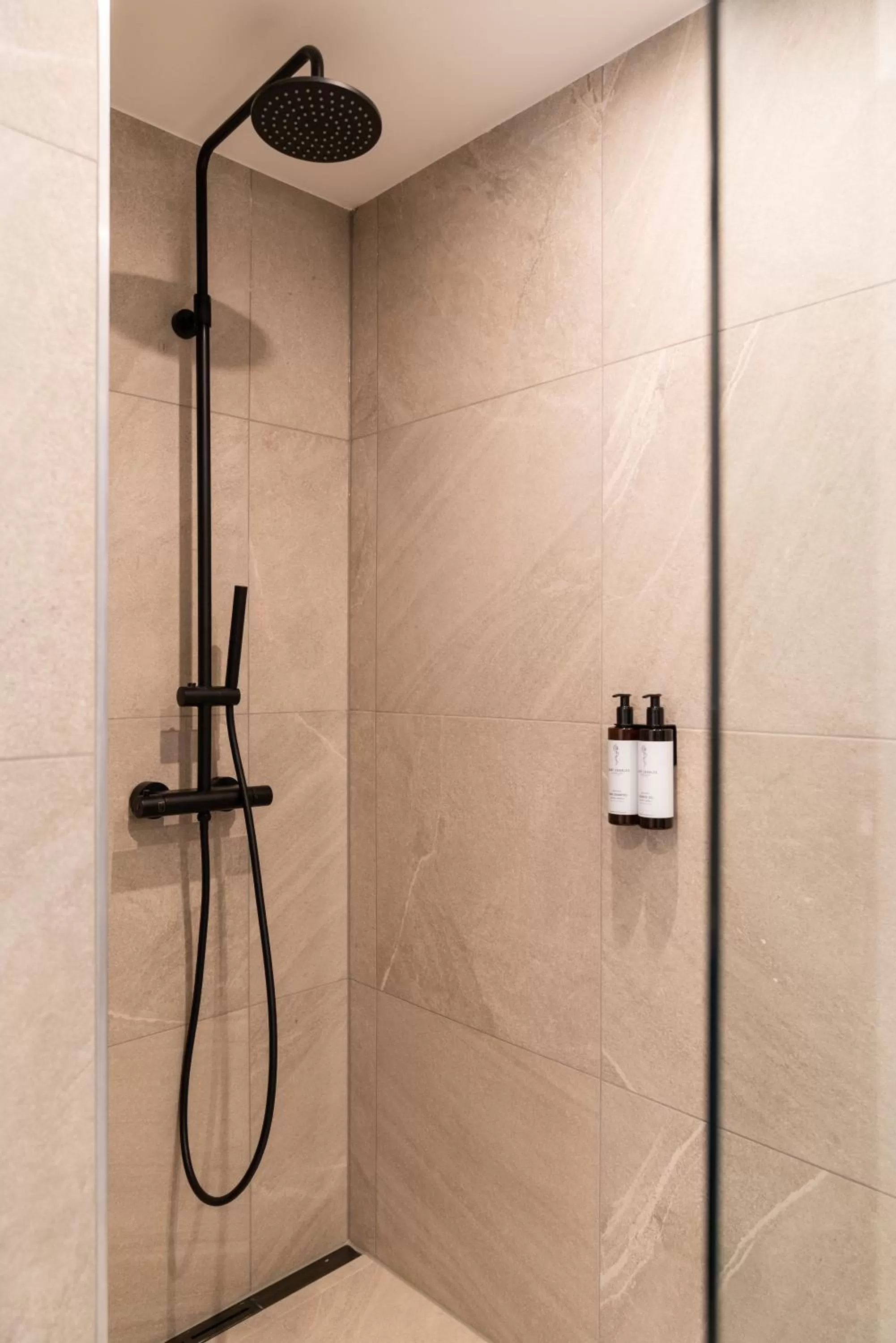 Shower in Black F Tower - Serviced Apartments