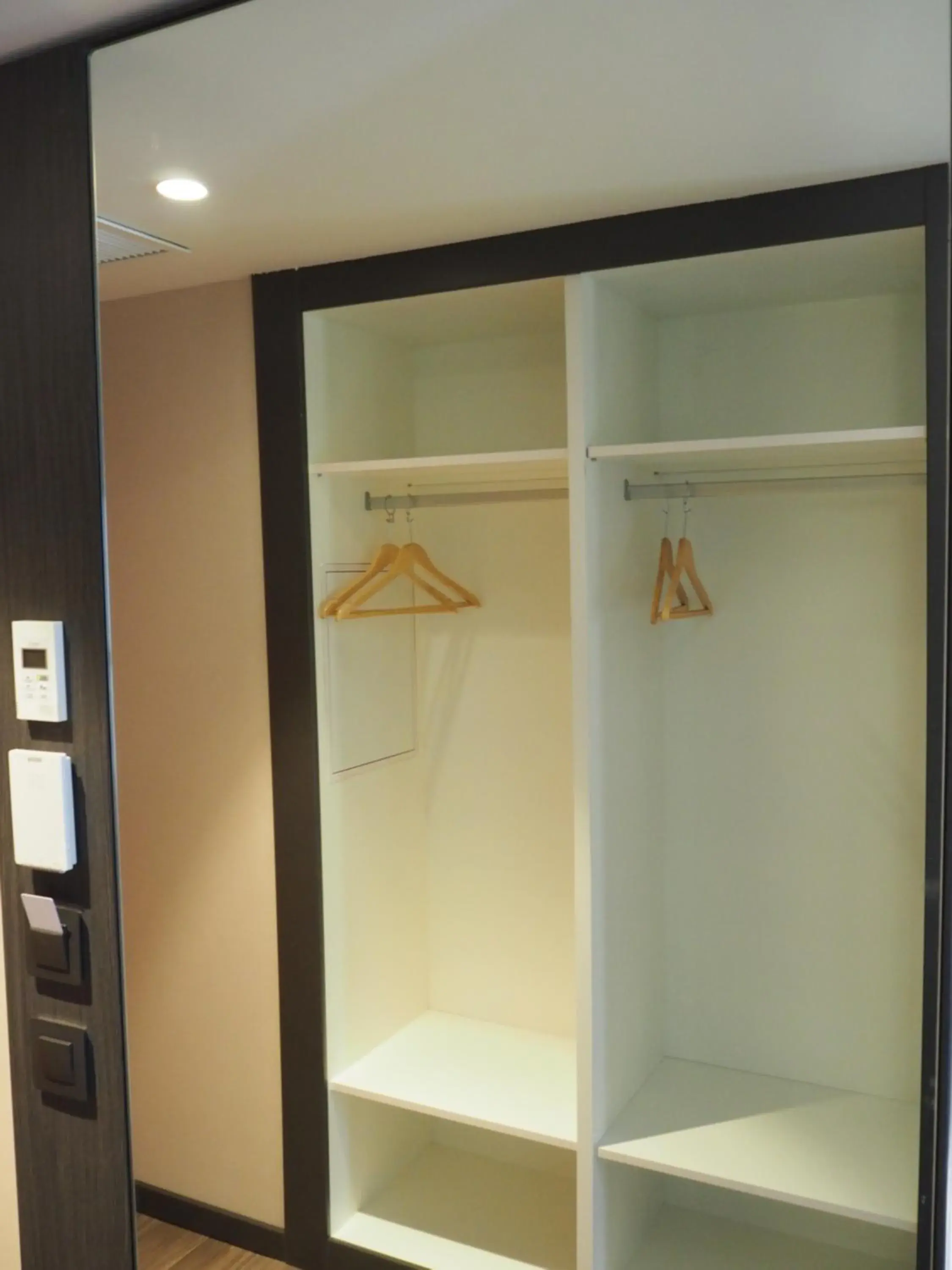 wardrobe in easyHotel Barcelona Fira