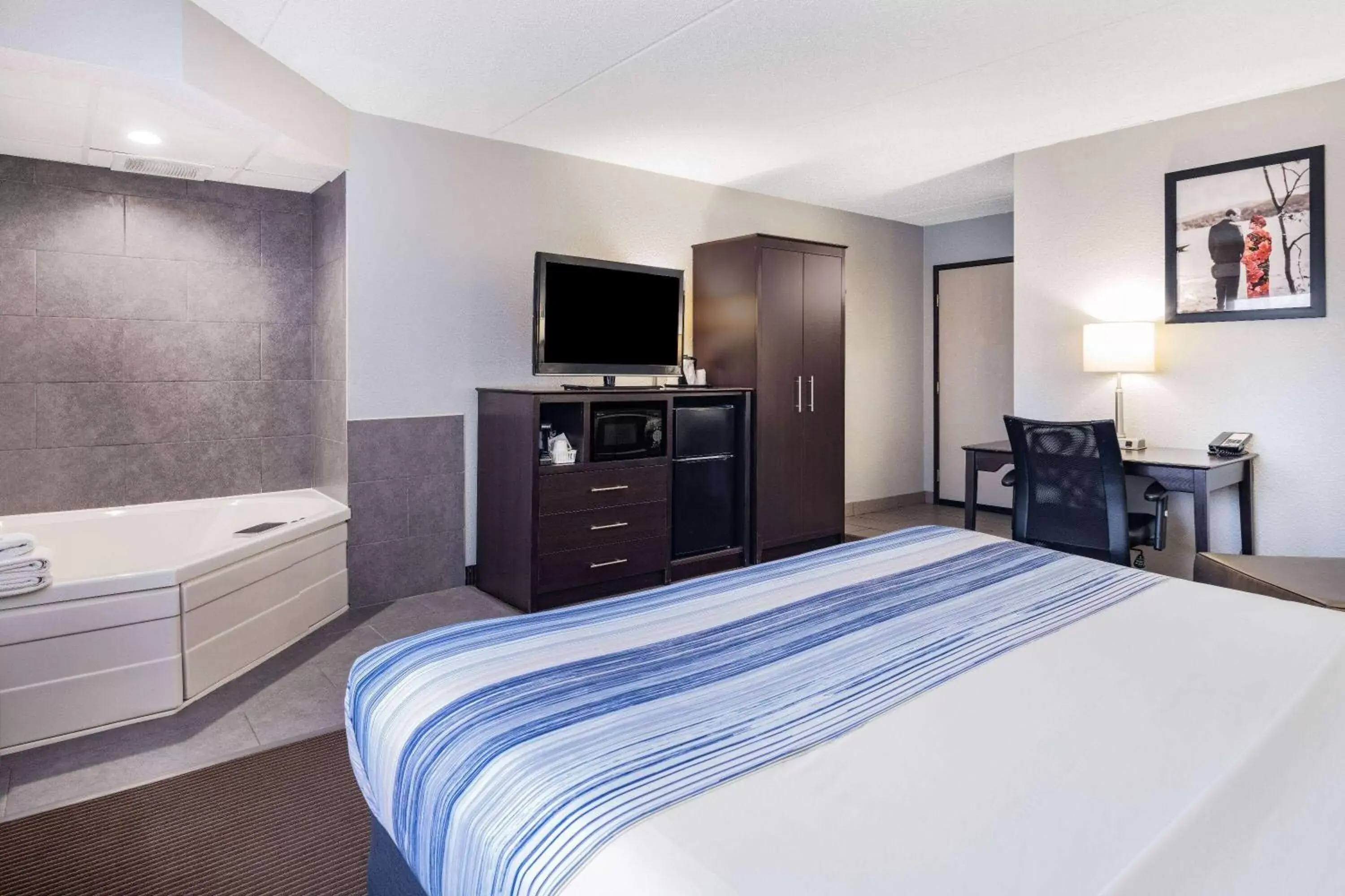 Photo of the whole room, Bed in AmericInn by Wyndham Plover Stevens Point Photo of the whole room, Bed in AmericInn by Wyndham Plover Stevens Point