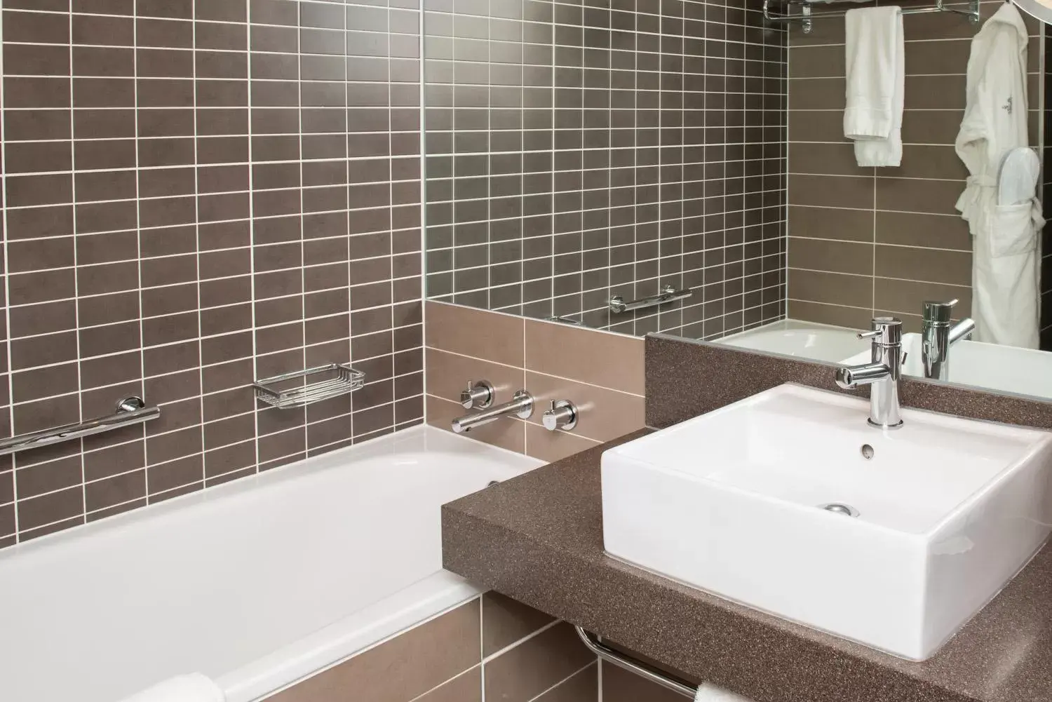 Shower, Bathroom in Crowne Plaza Manchester City Centre, an IHG Hotel