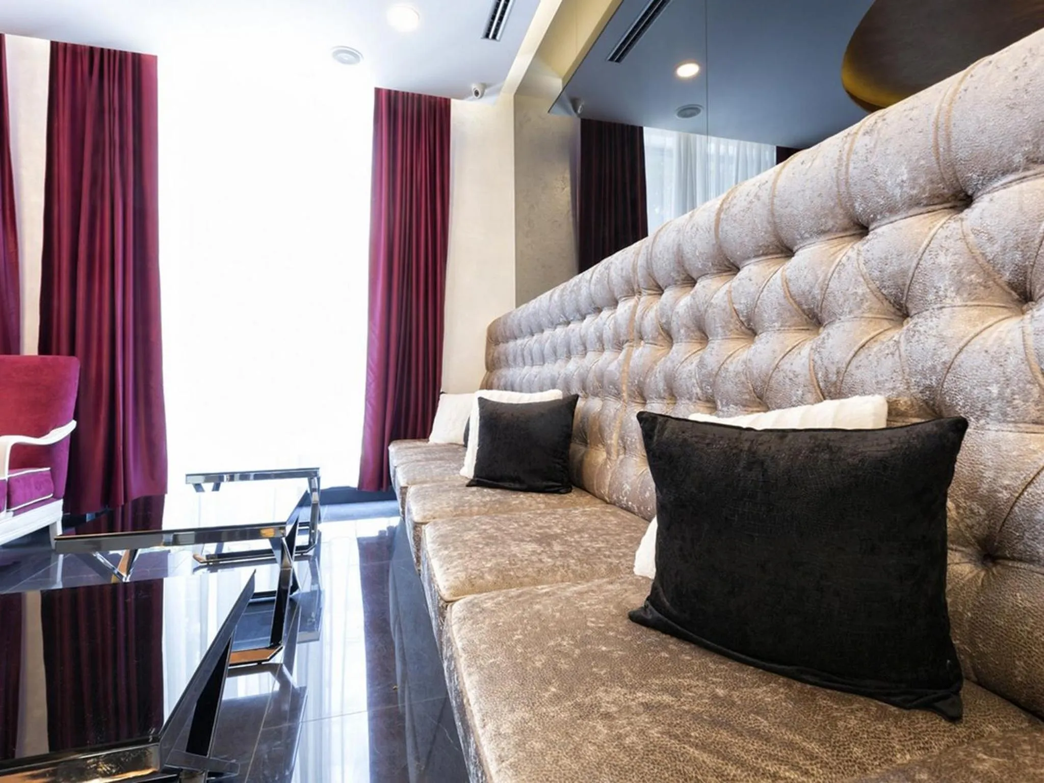 Communal lounge/ TV room in Nova City Garni Hotel Signature Collection