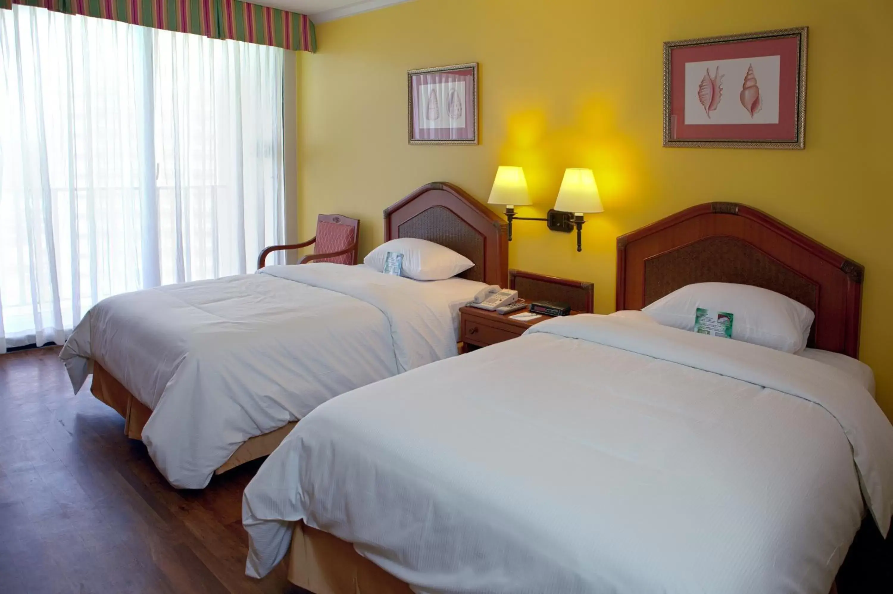 Bed in Guam Reef Hotel