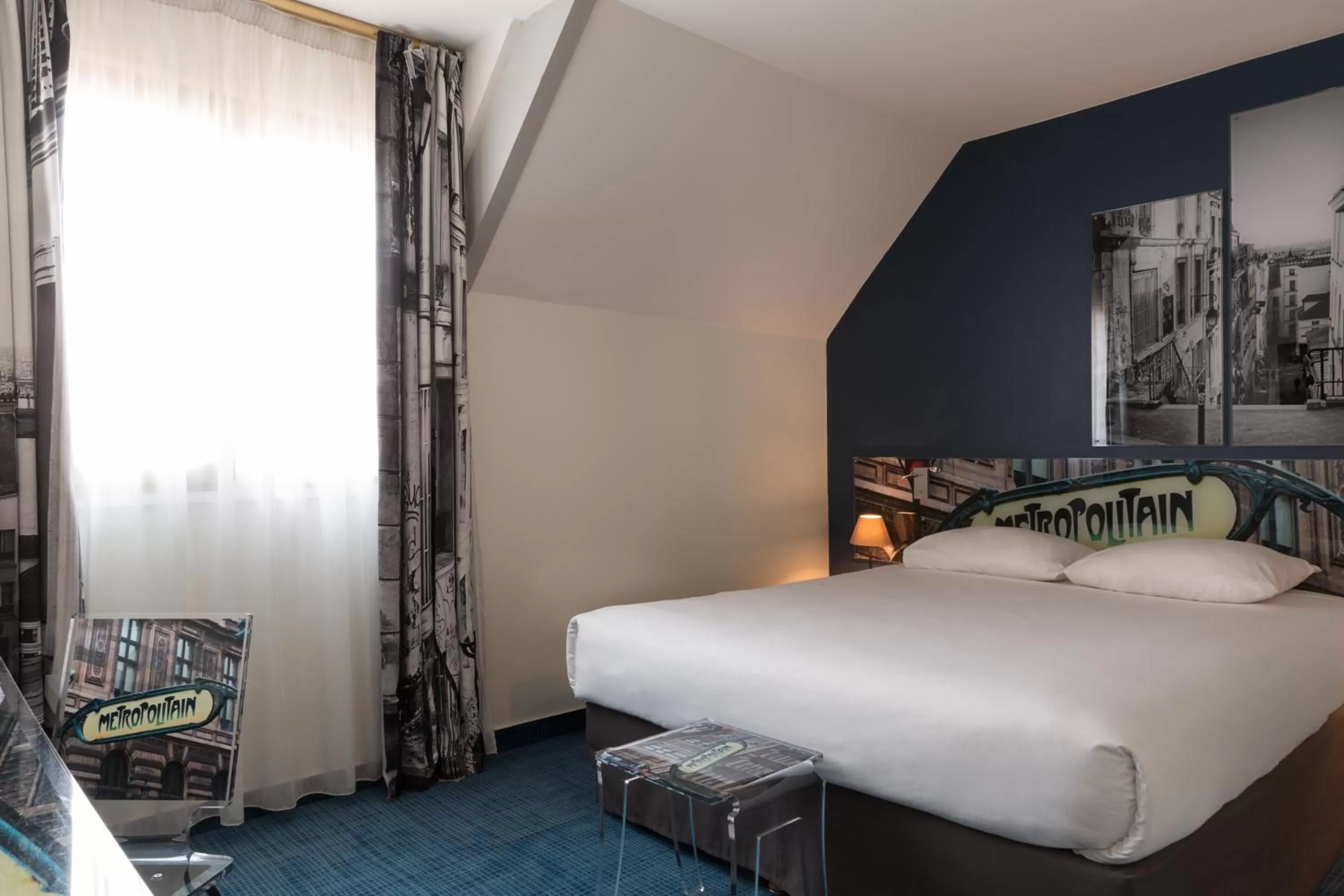 Photo of the whole room, Bed in Hotel Le Cardinal Rueil Centre