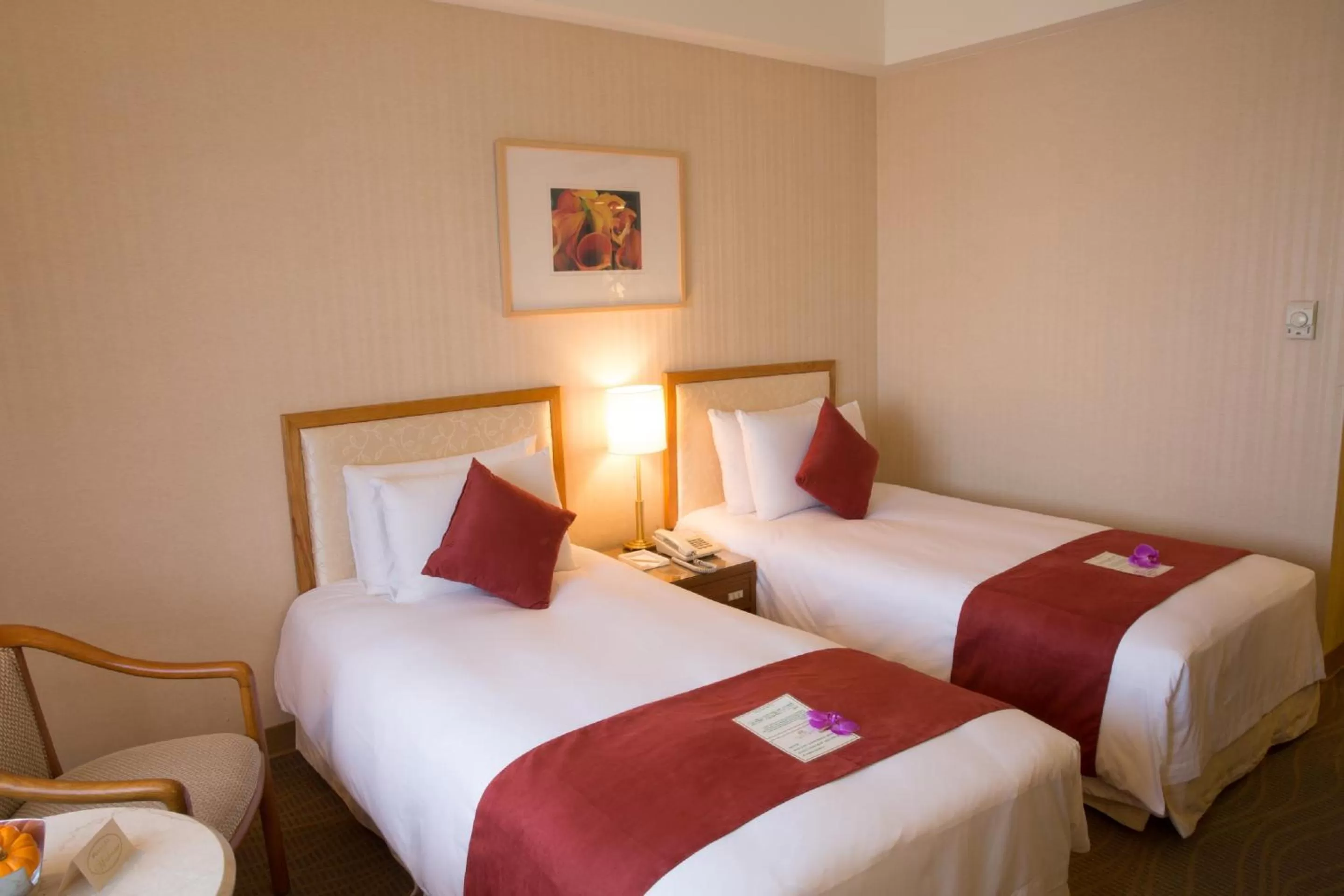 Bed in Hotel Riverview Taipei