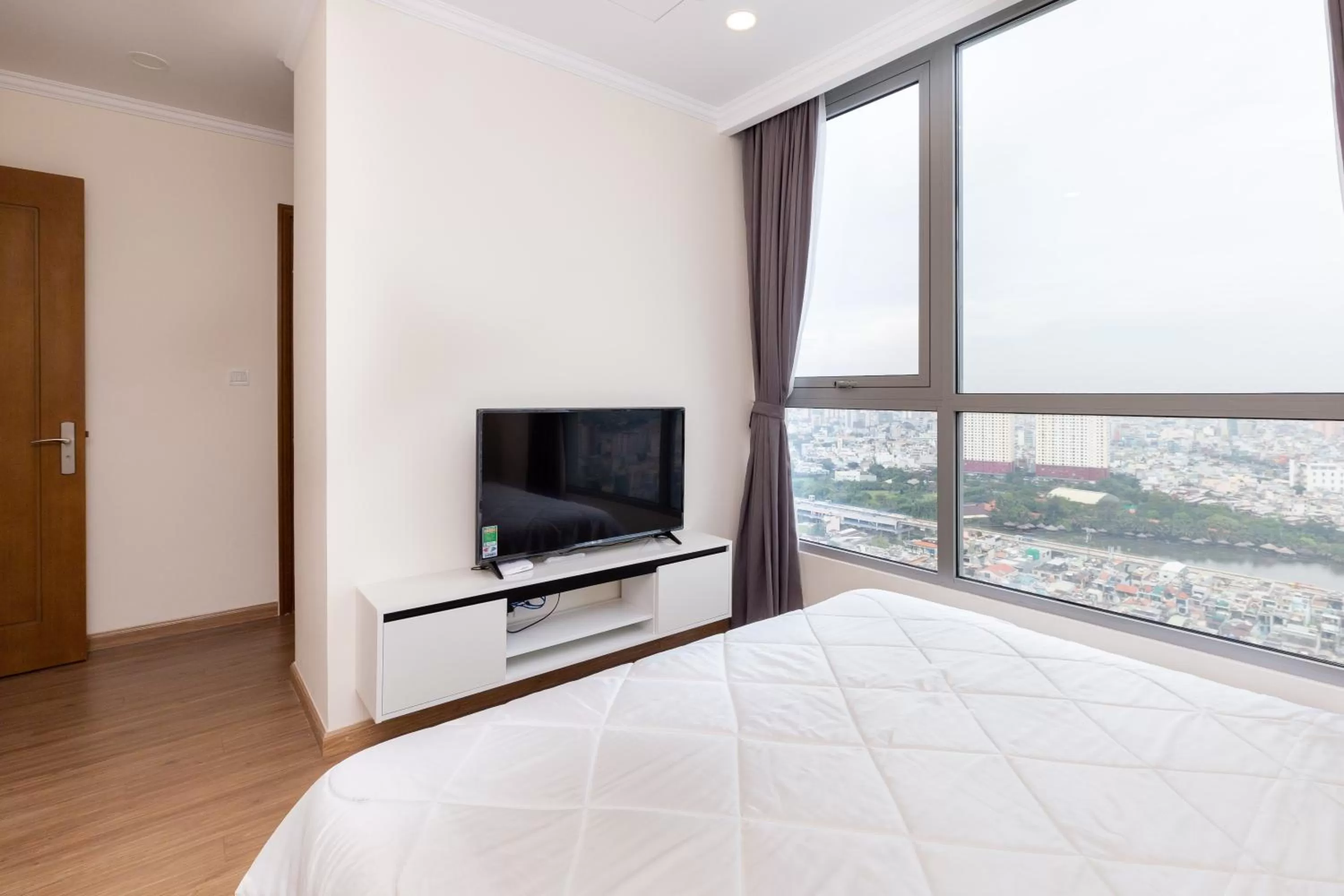 Bed, TV/Entertainment Center in Vinhomes Central Park-Nice Homes