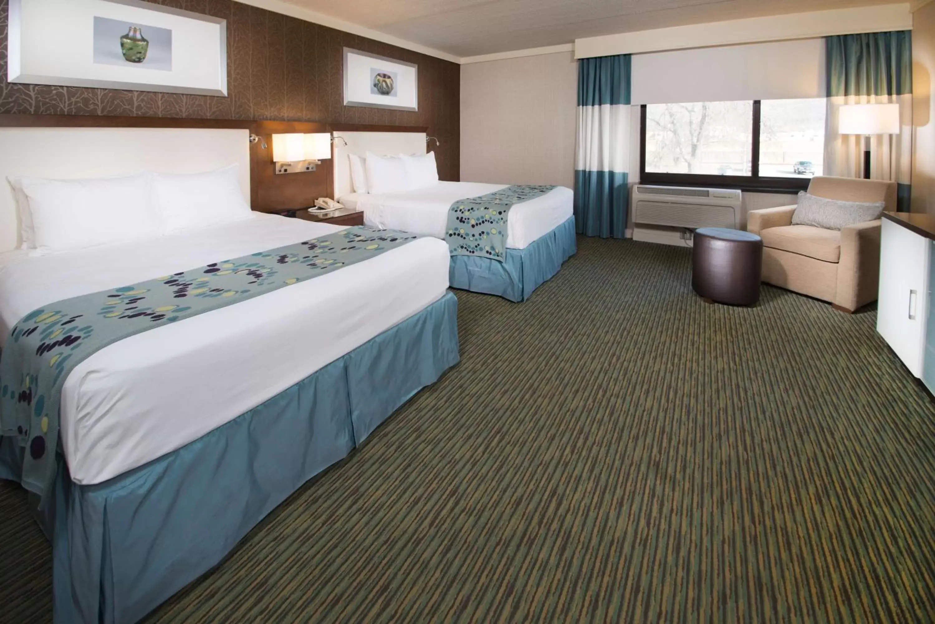 Photo of the whole room, Bed in Radisson Hotel Corning