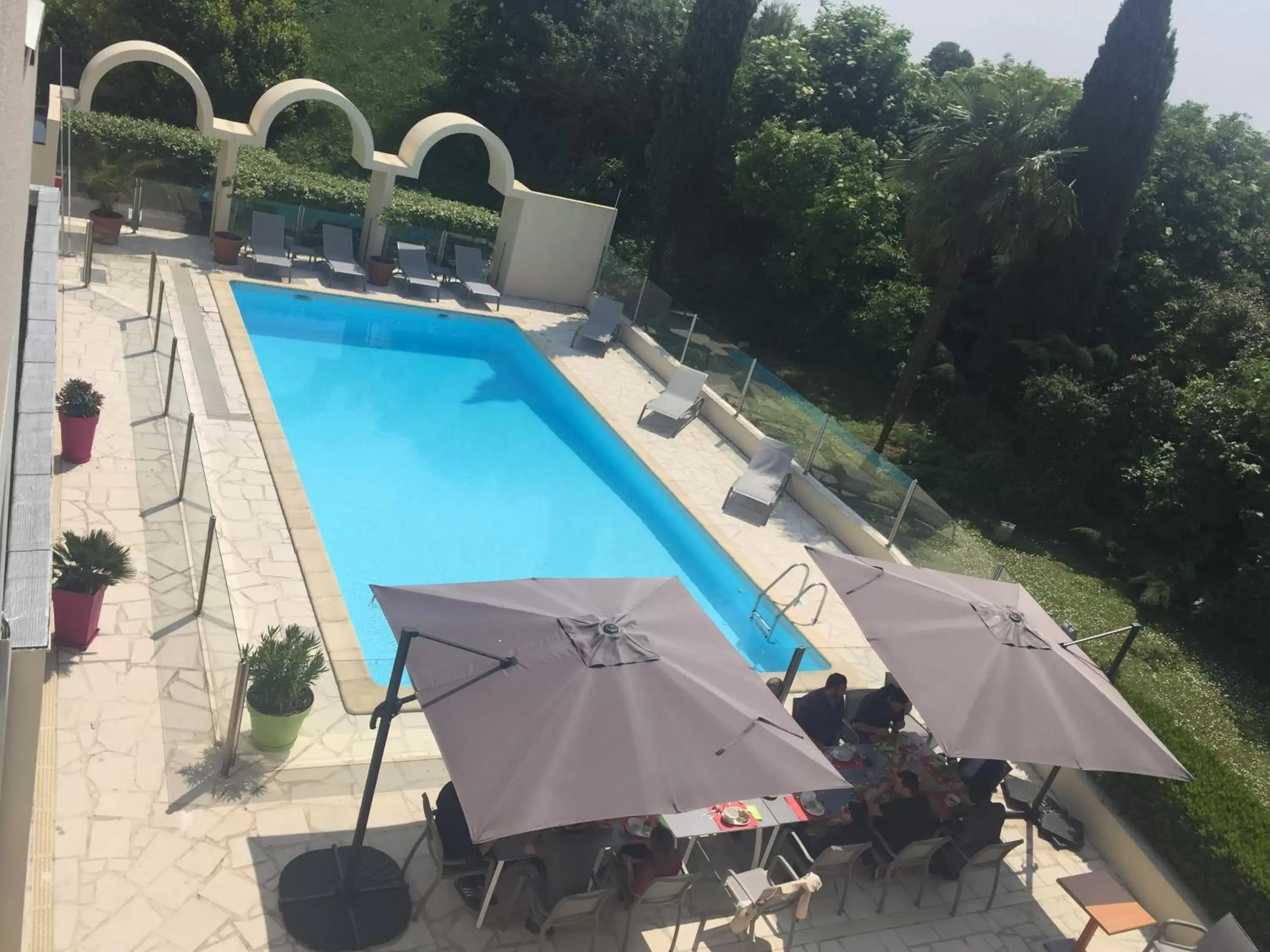 Patio, Pool View in Ibis Styles Cognac