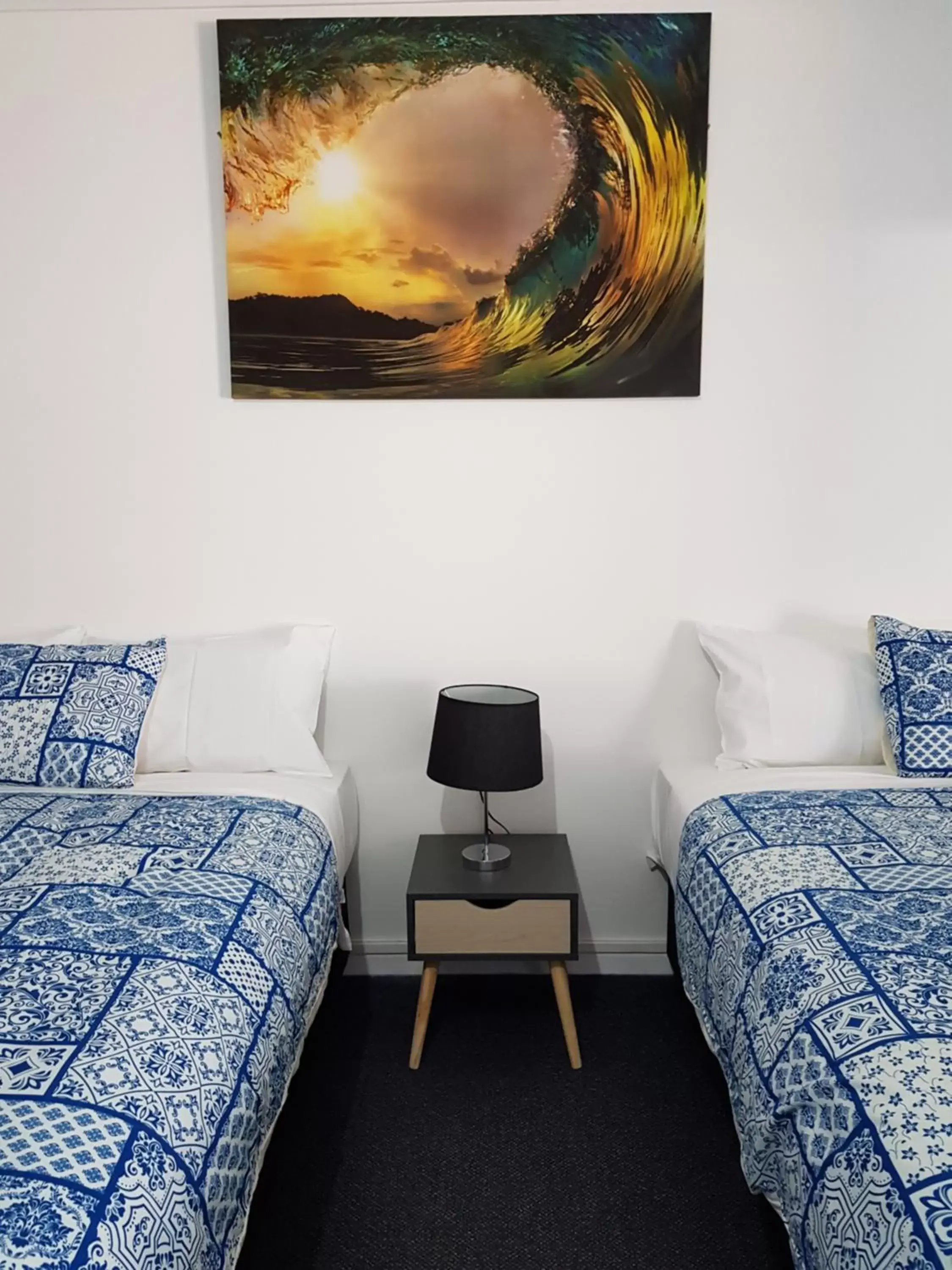 Bed in The Q Motel Rockhampton