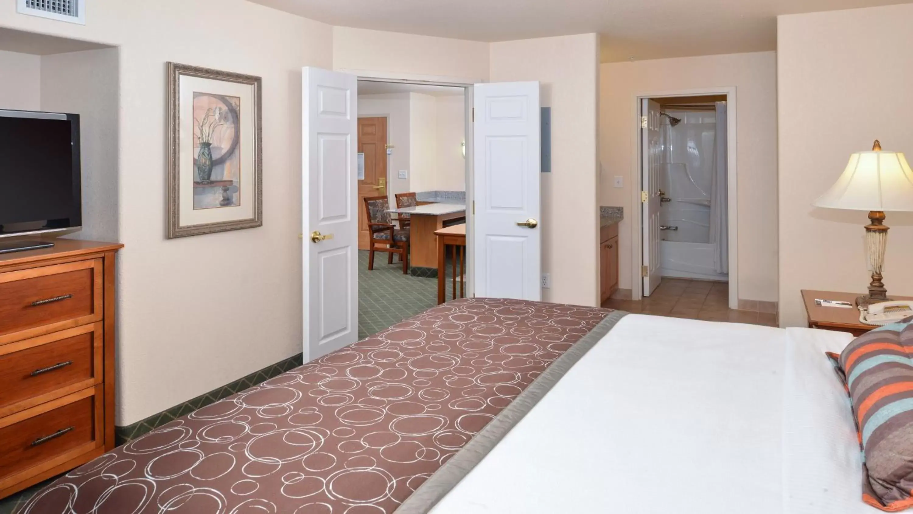 Photo of the whole room, Bed in Staybridge Suites - Calgary Airport, an IHG Hotel