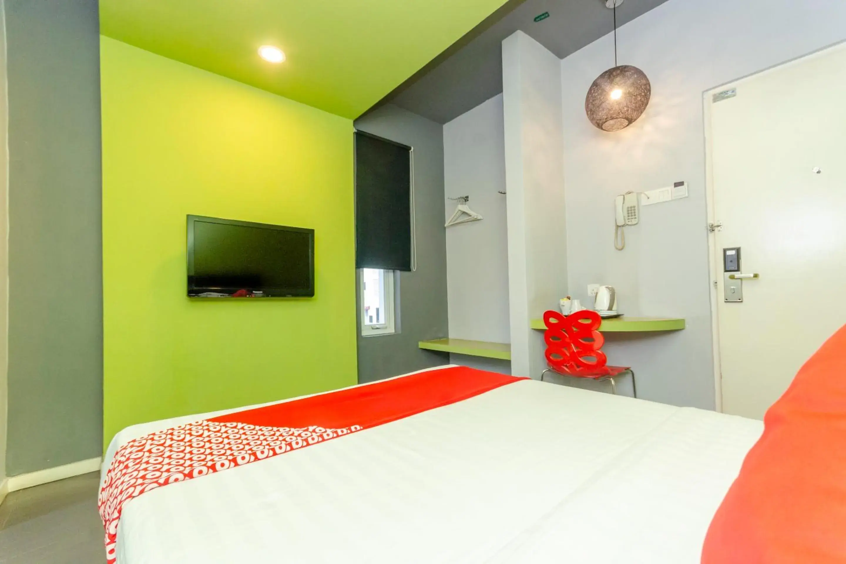 Bedroom, Bed in OYO 902 Rooms Boutique Hotel