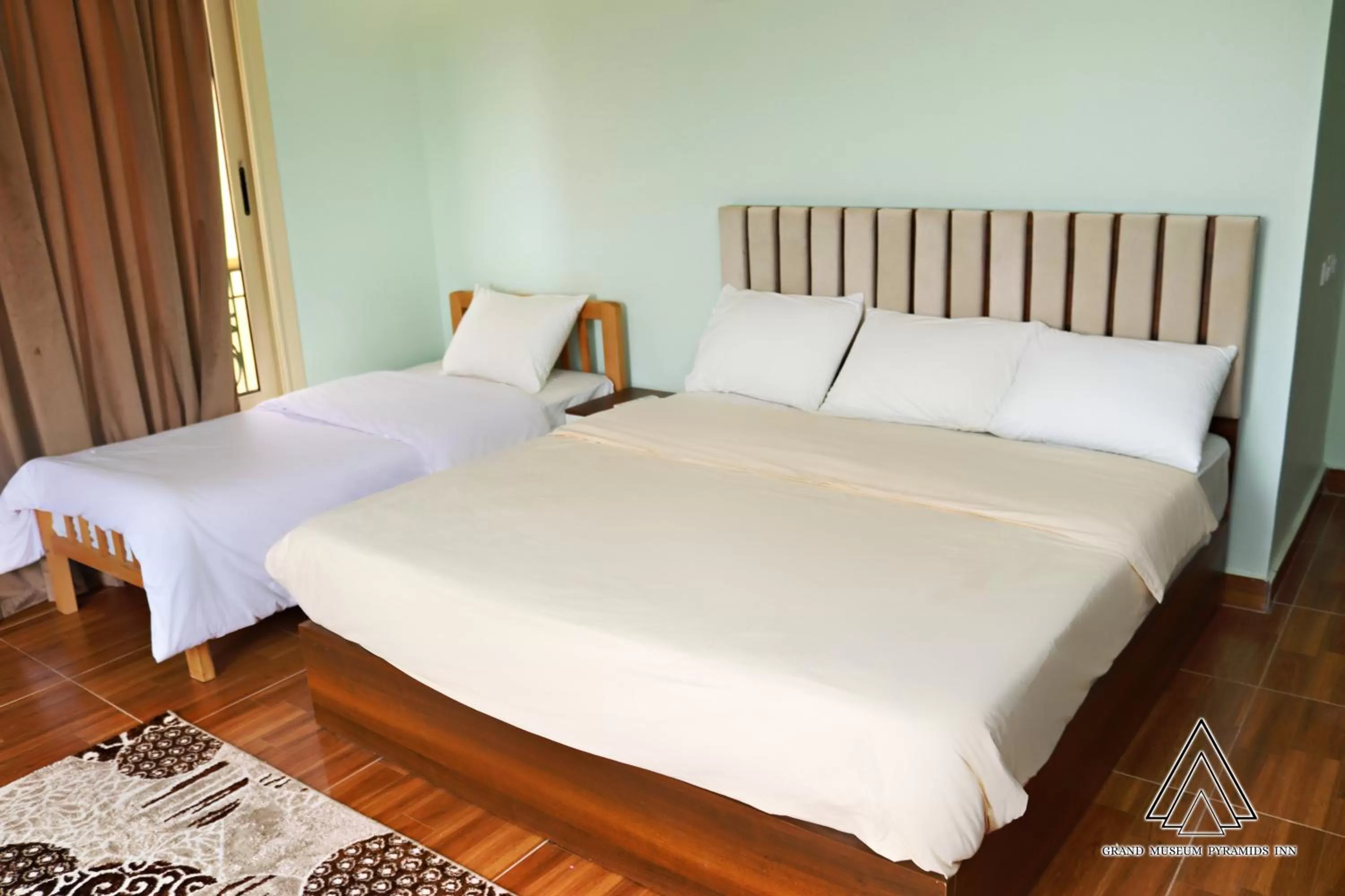 Bed in Grand Museum Pyramids Inn