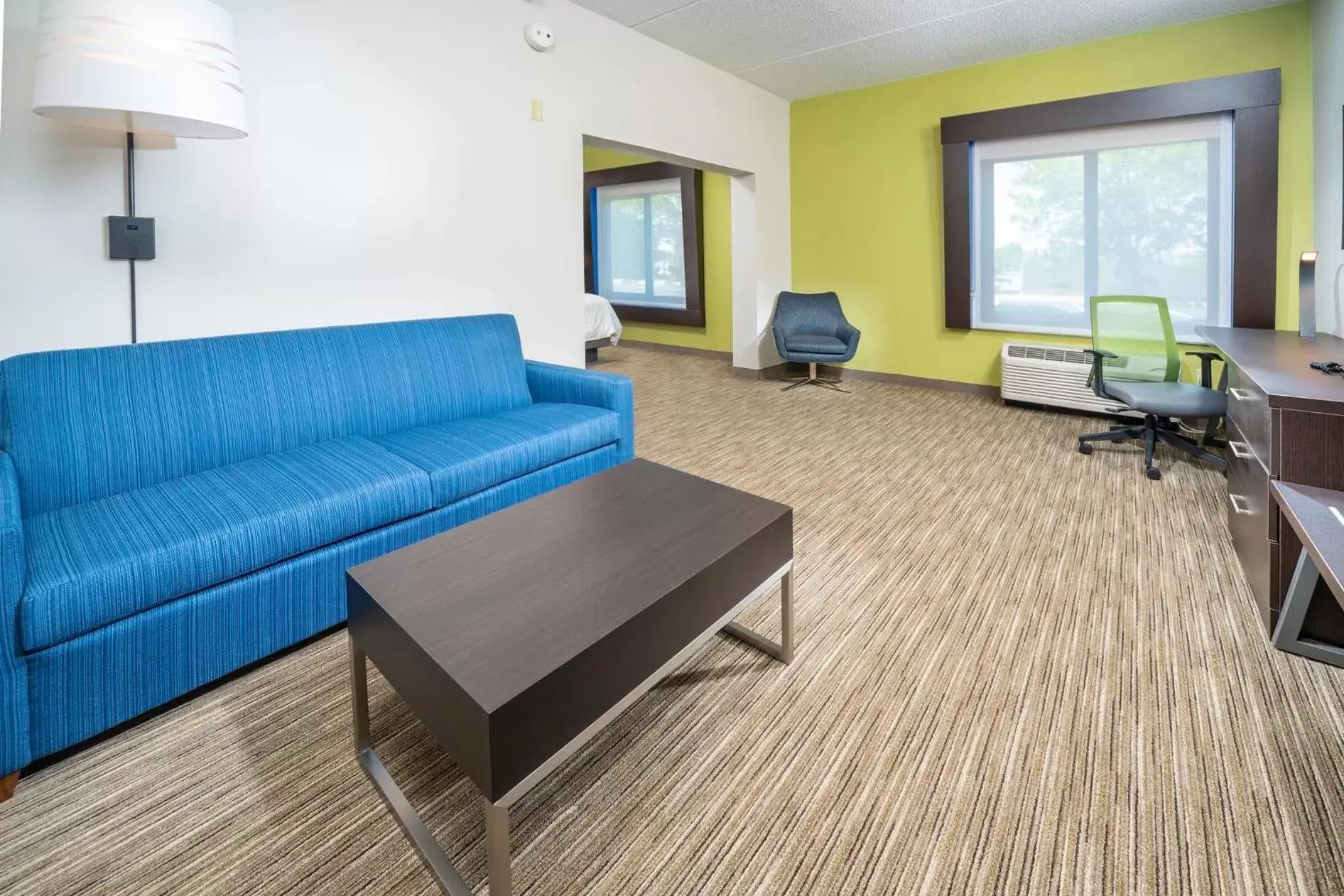 Photo of the whole room, Seating Area in Holiday Inn Express Clayton Southeast Raleigh, an IHG Hotel