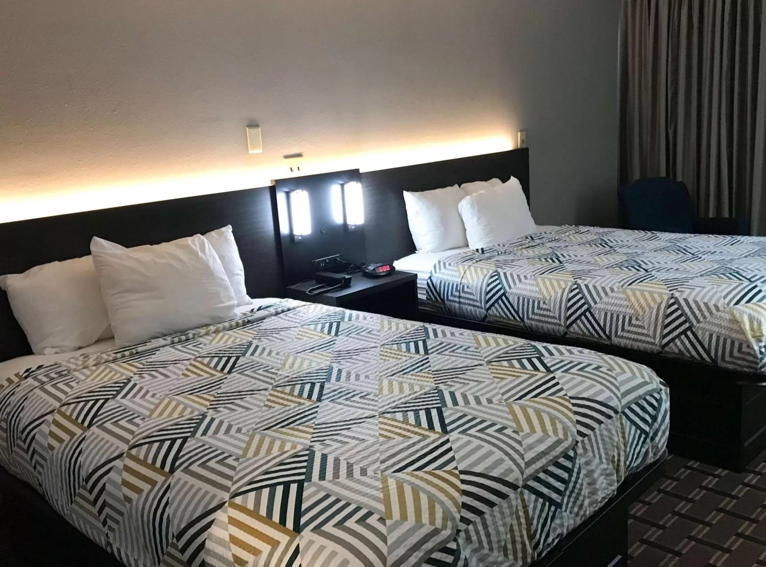 Photo of the whole room, Bed in Studio 6 Suites Tupelo, MS