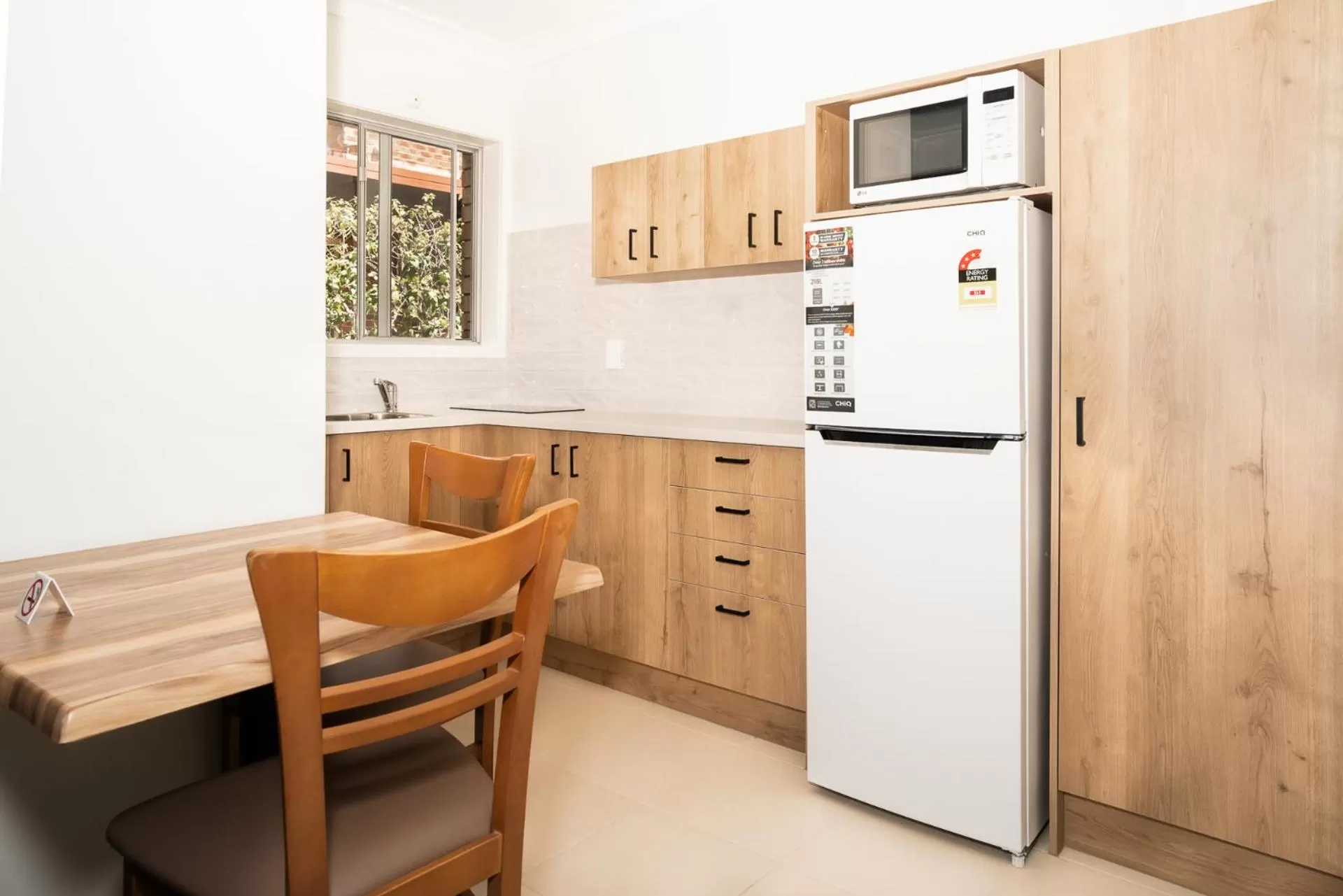 Kitchen or kitchenette in Caribbean Motel