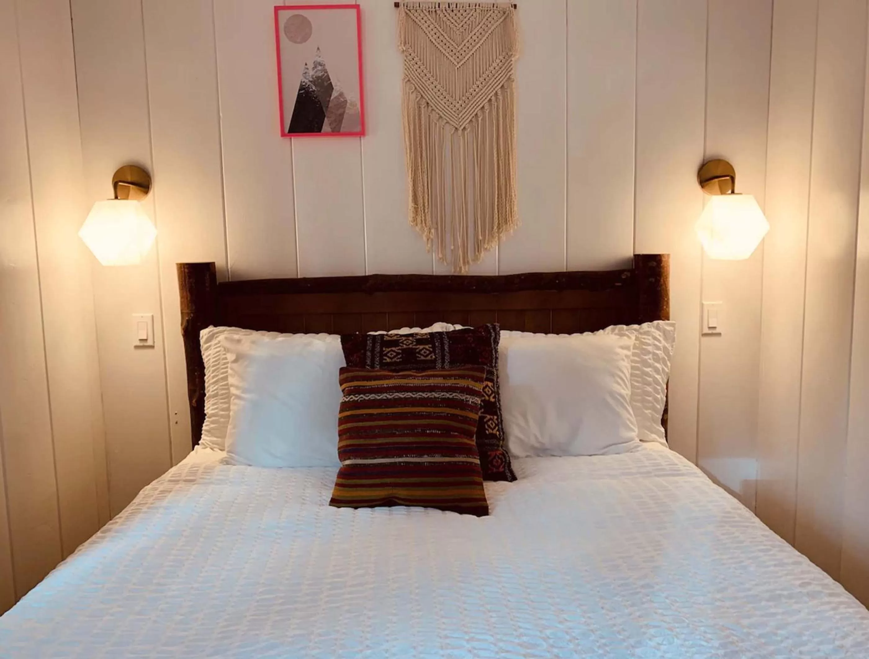 Bed in Grand Pine Cabins