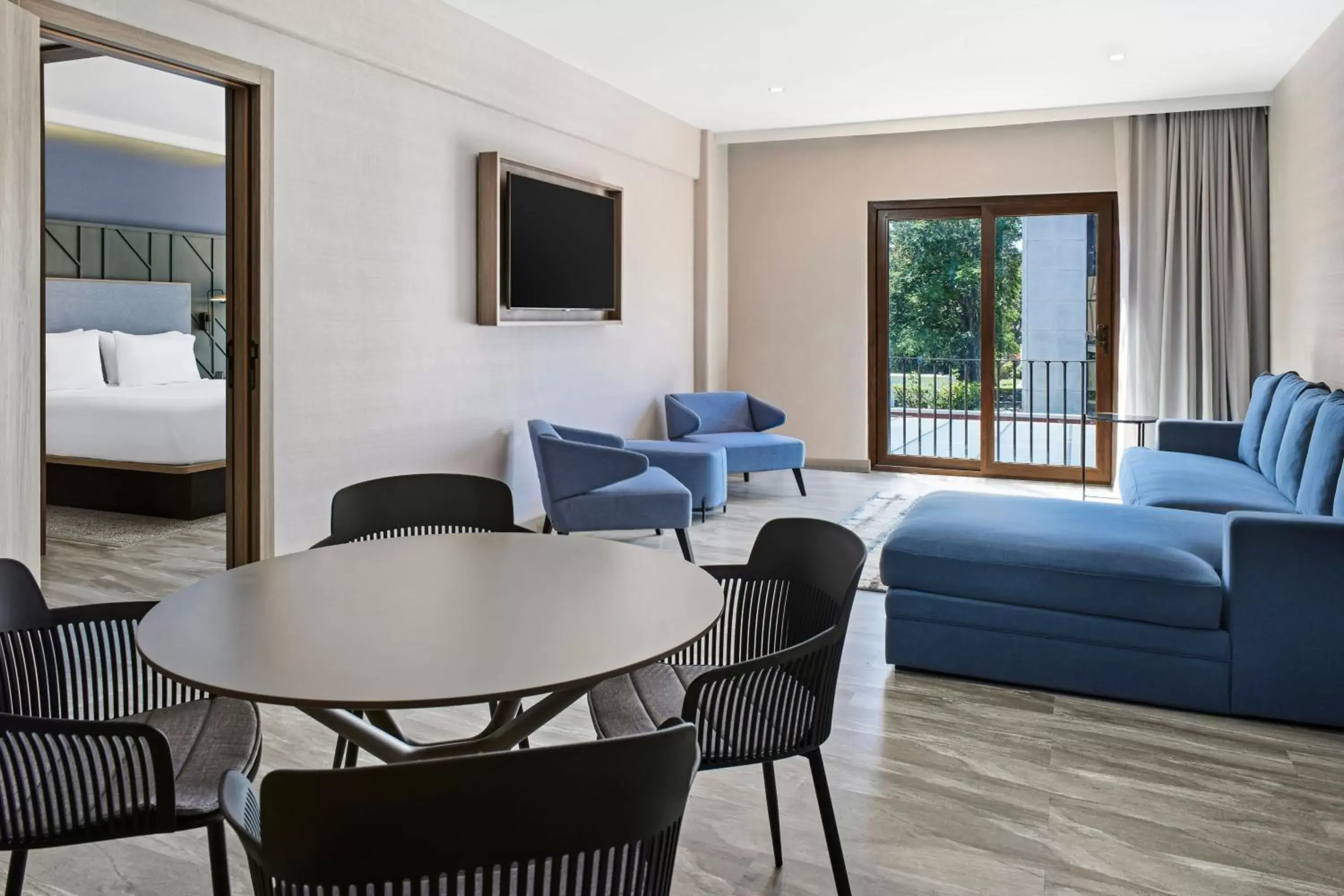 Bedroom, Seating Area in Courtyard by Marriott San Jose Escazu