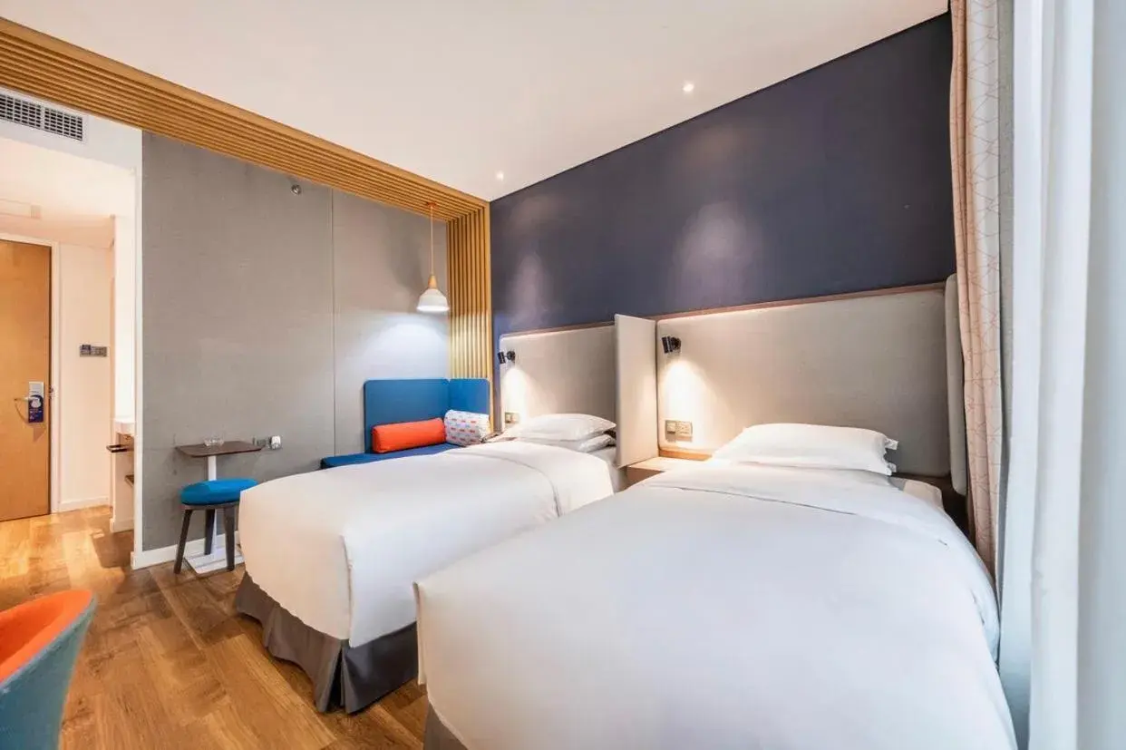 Bed in Holiday Inn Express Hefei Shushan by IHG Bed in Holiday Inn Express Hefei Shushan by IHG